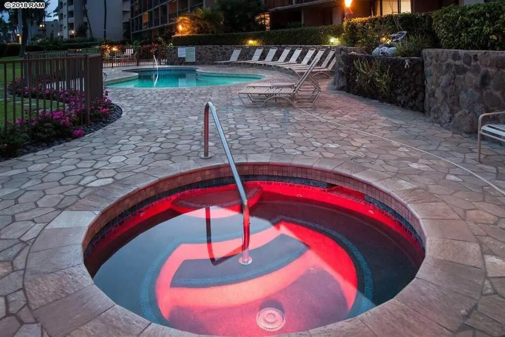 Hot Tub in Stunning Maui Direct Ocean front on the beach, Walk to beach from Condo, Watch Turtles, Whales, AC in all rooms ocean view Pool and Spa