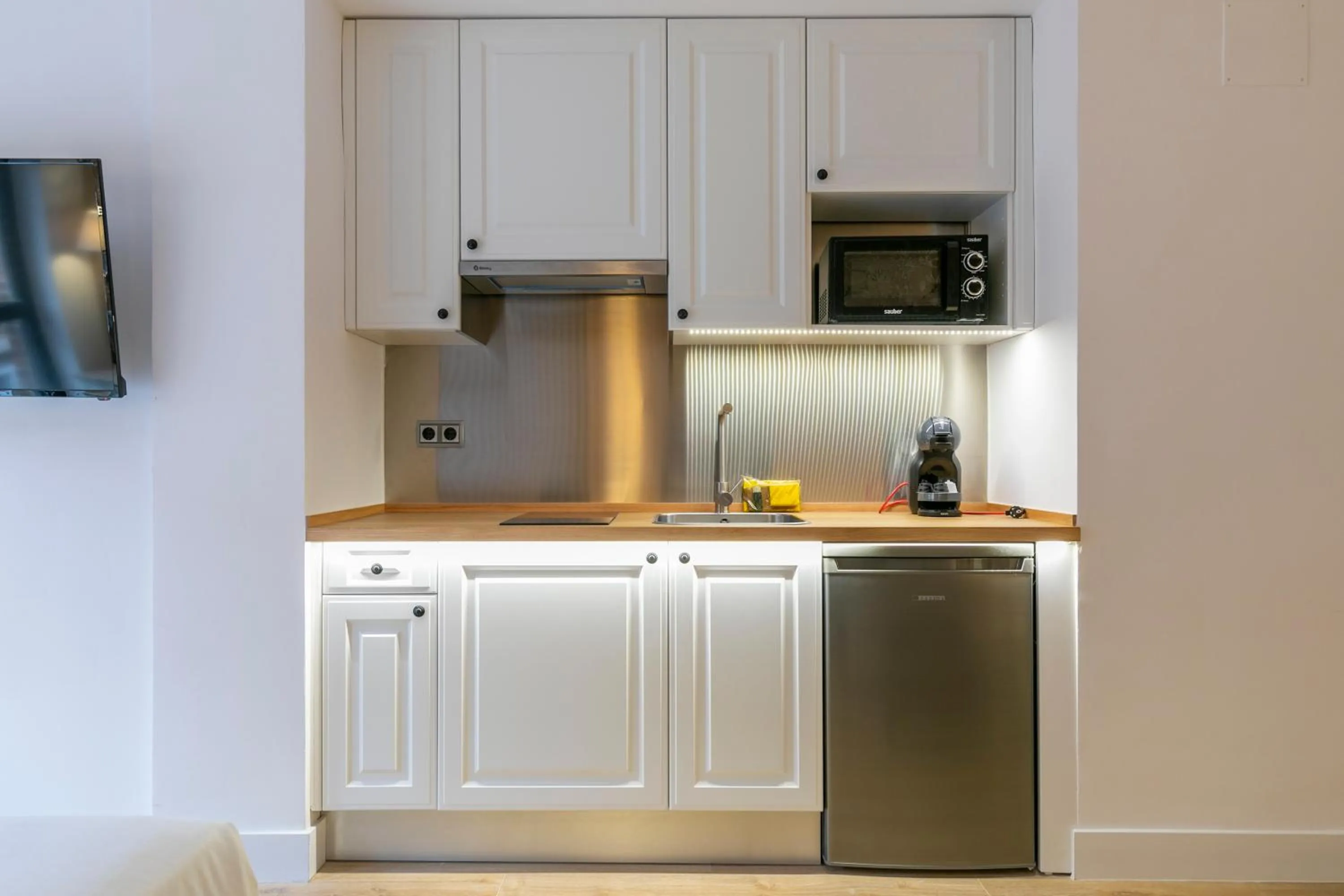 Kitchen or kitchenette in H-A Aparthotel Hotel Quo