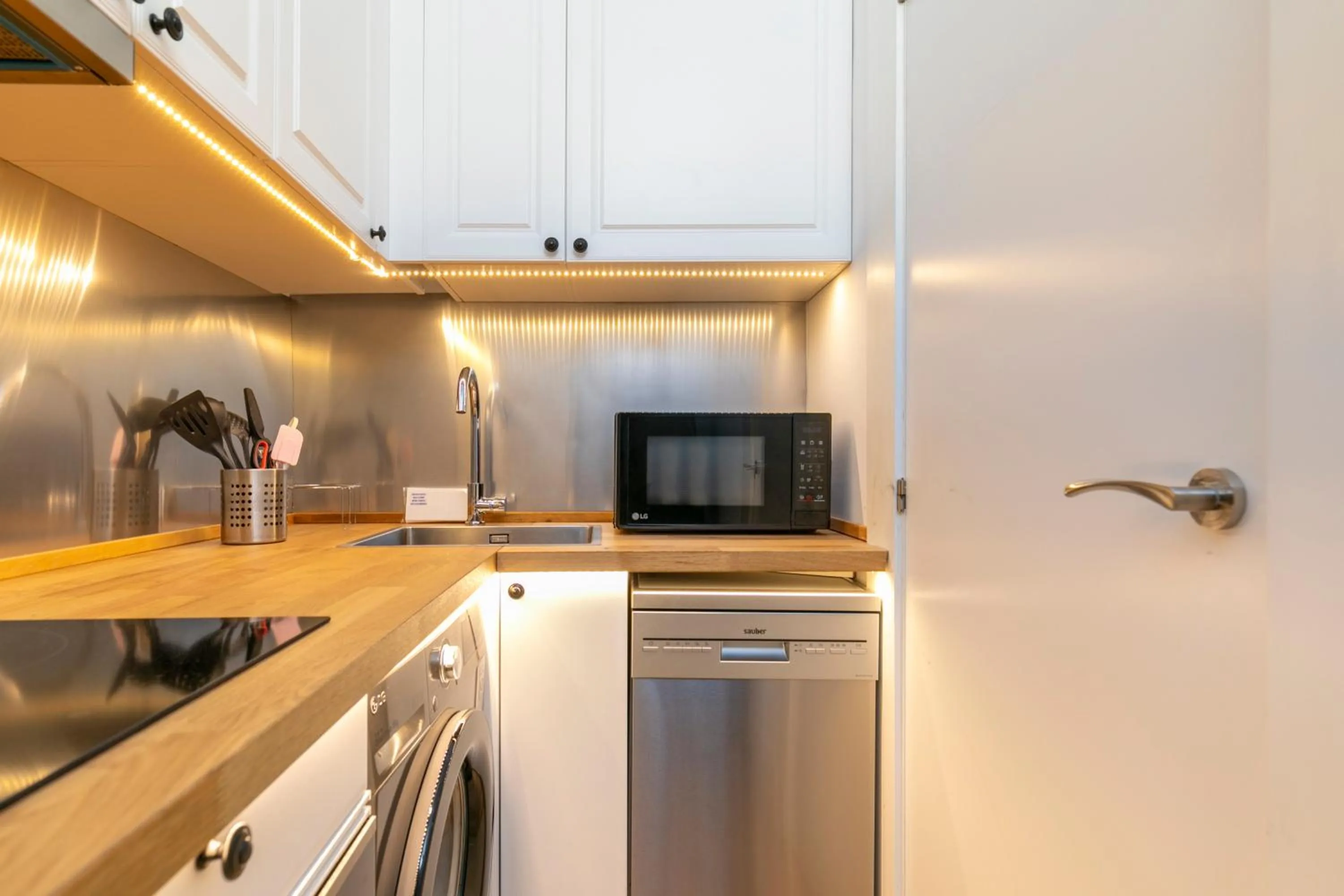 Kitchen or kitchenette in H-A Aparthotel Hotel Quo