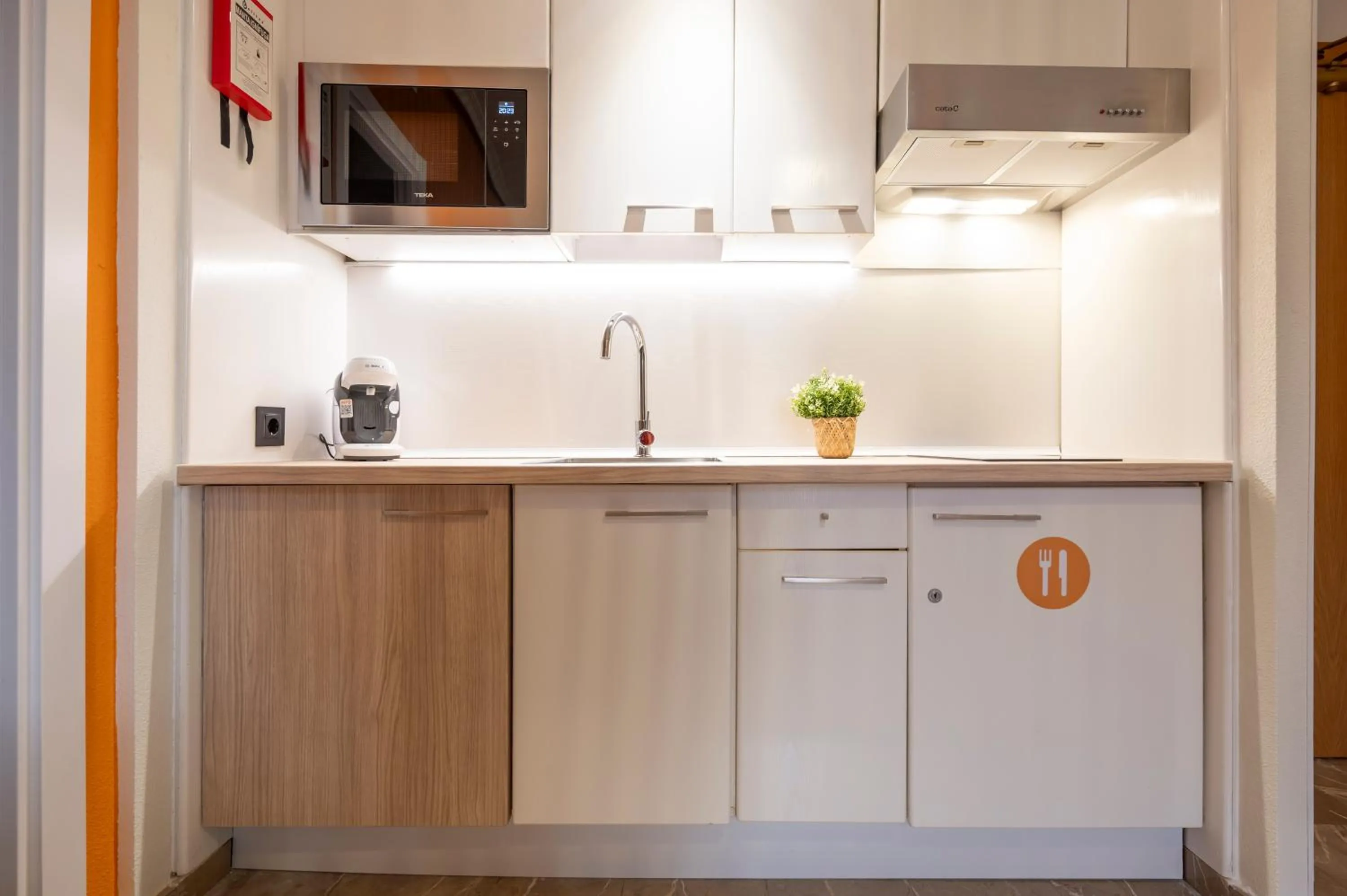 Kitchen or kitchenette in Apartamentos G3 Galeon