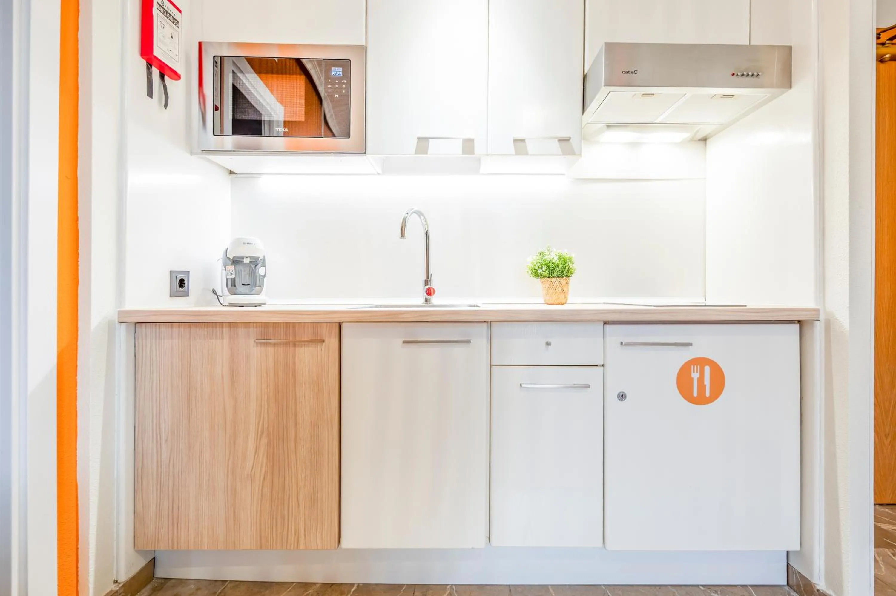 Kitchen or kitchenette in Apartamentos G3 Galeon