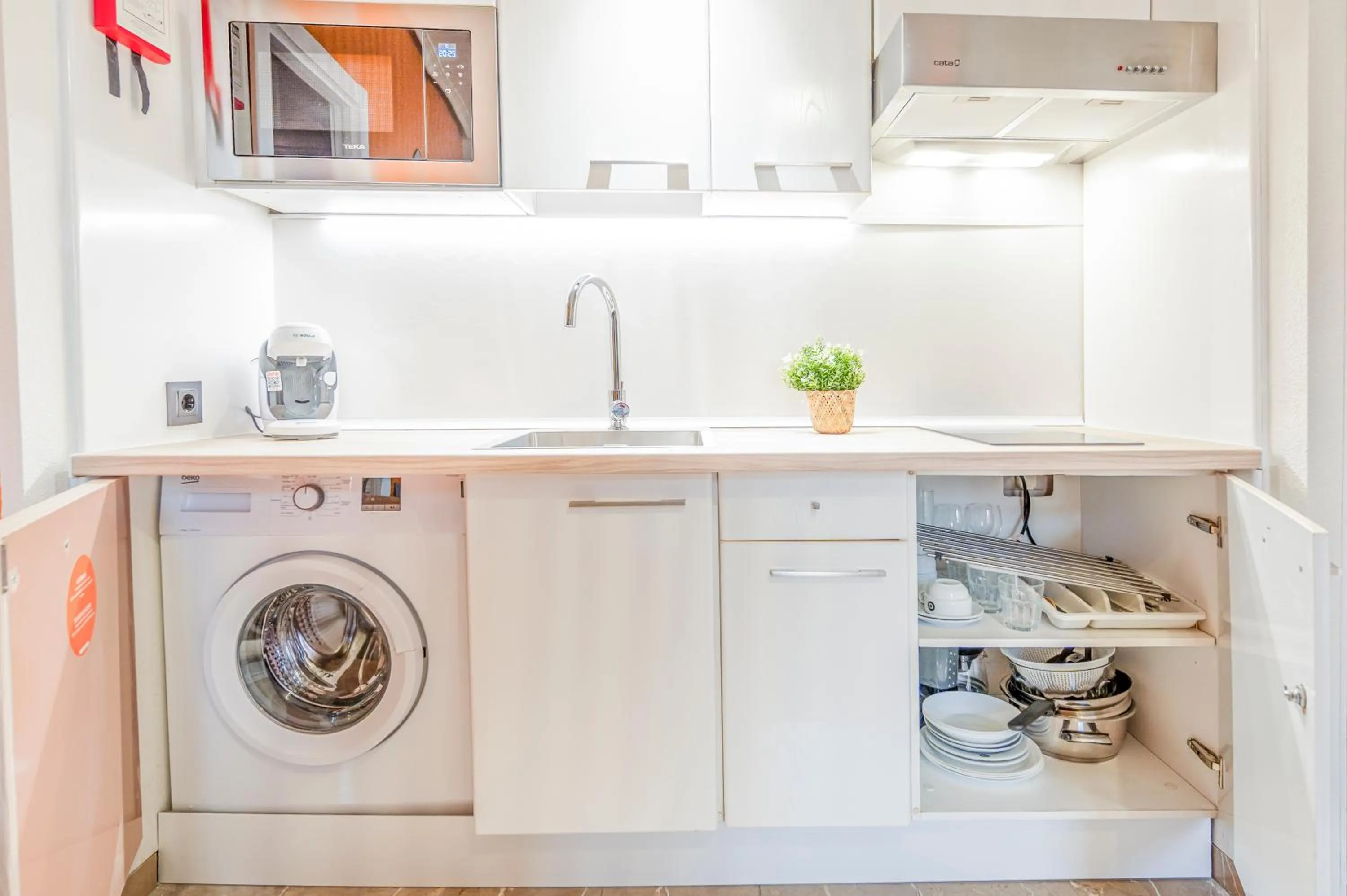 Kitchen or kitchenette in Apartamentos G3 Galeon