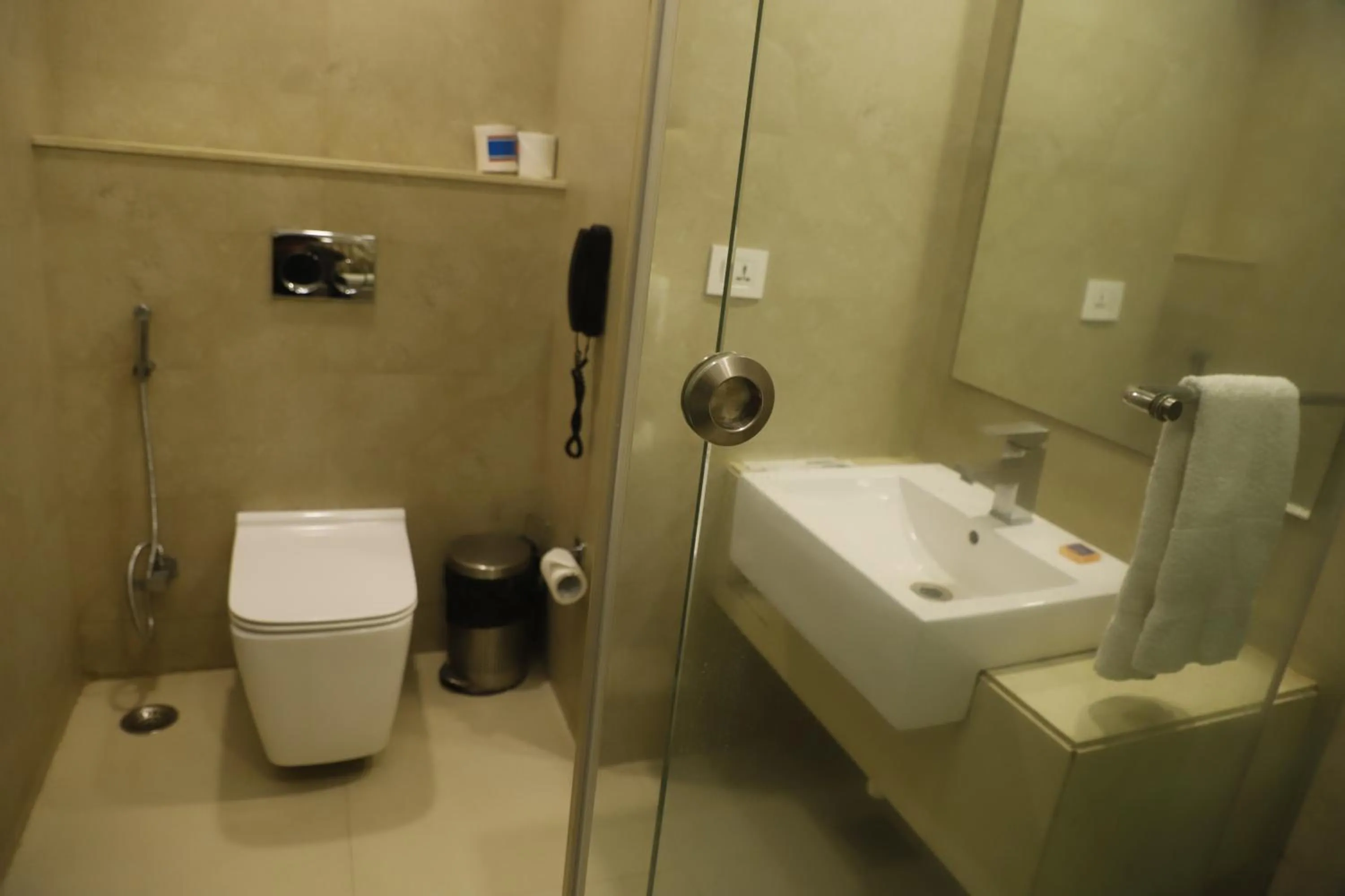 Toilet in Udman Hotel at 18km from IGI Airport, By Ferns N Petals, Chattarpur, Delhi