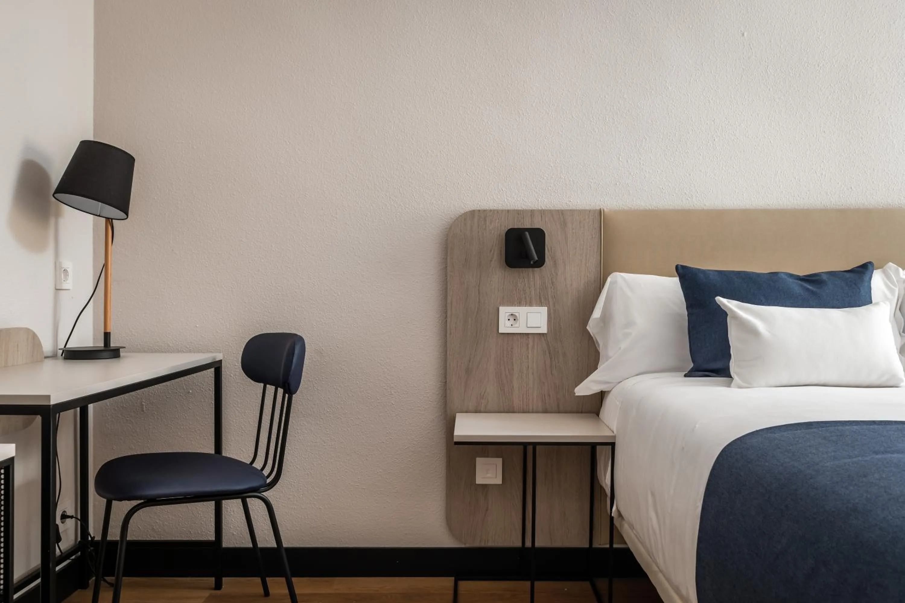 Bed in Hotel Don Jaime 54