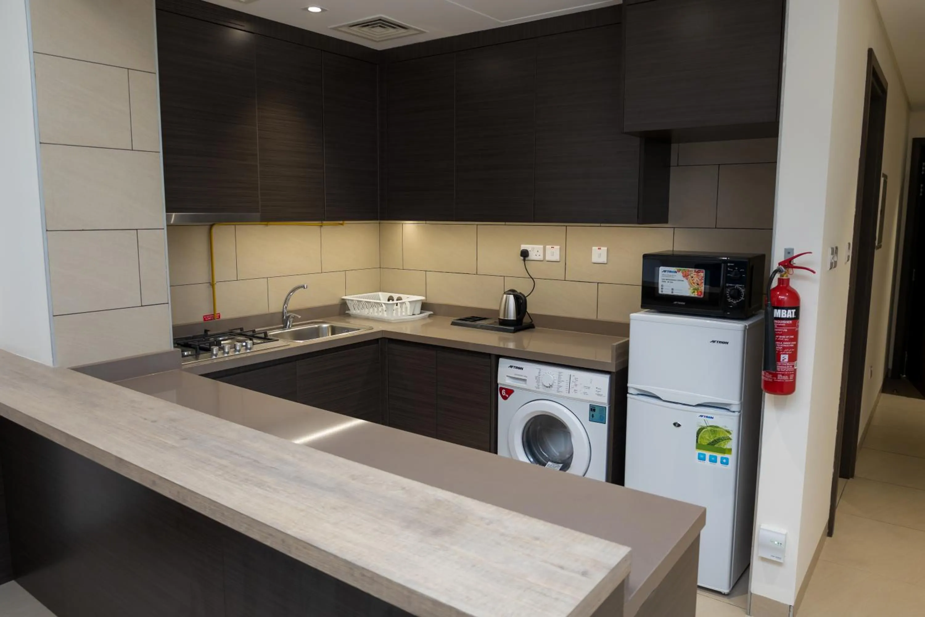 Kitchen or kitchenette in Azur Regency Hotel Apartments