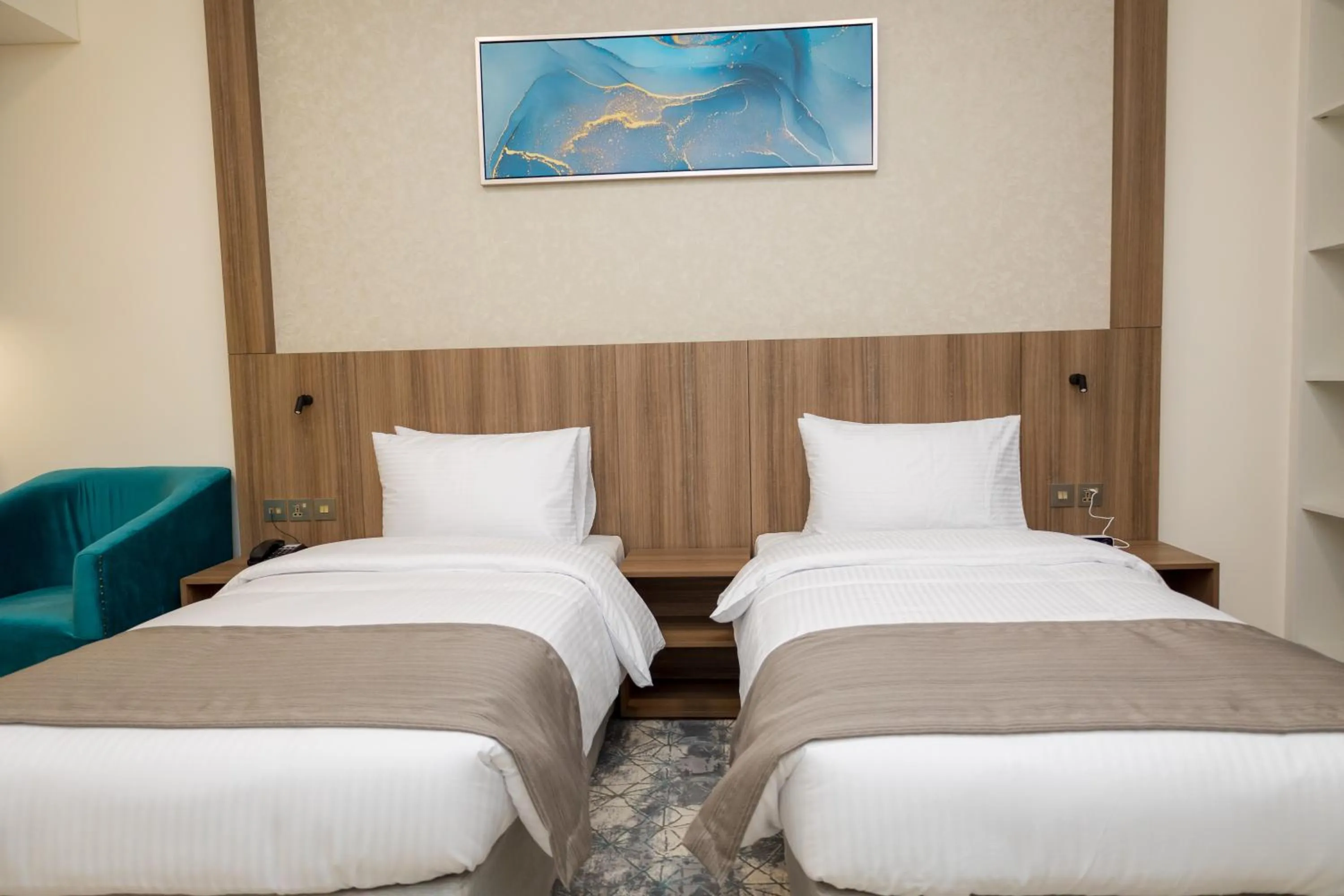 Bed in Azur Regency Hotel Apartments