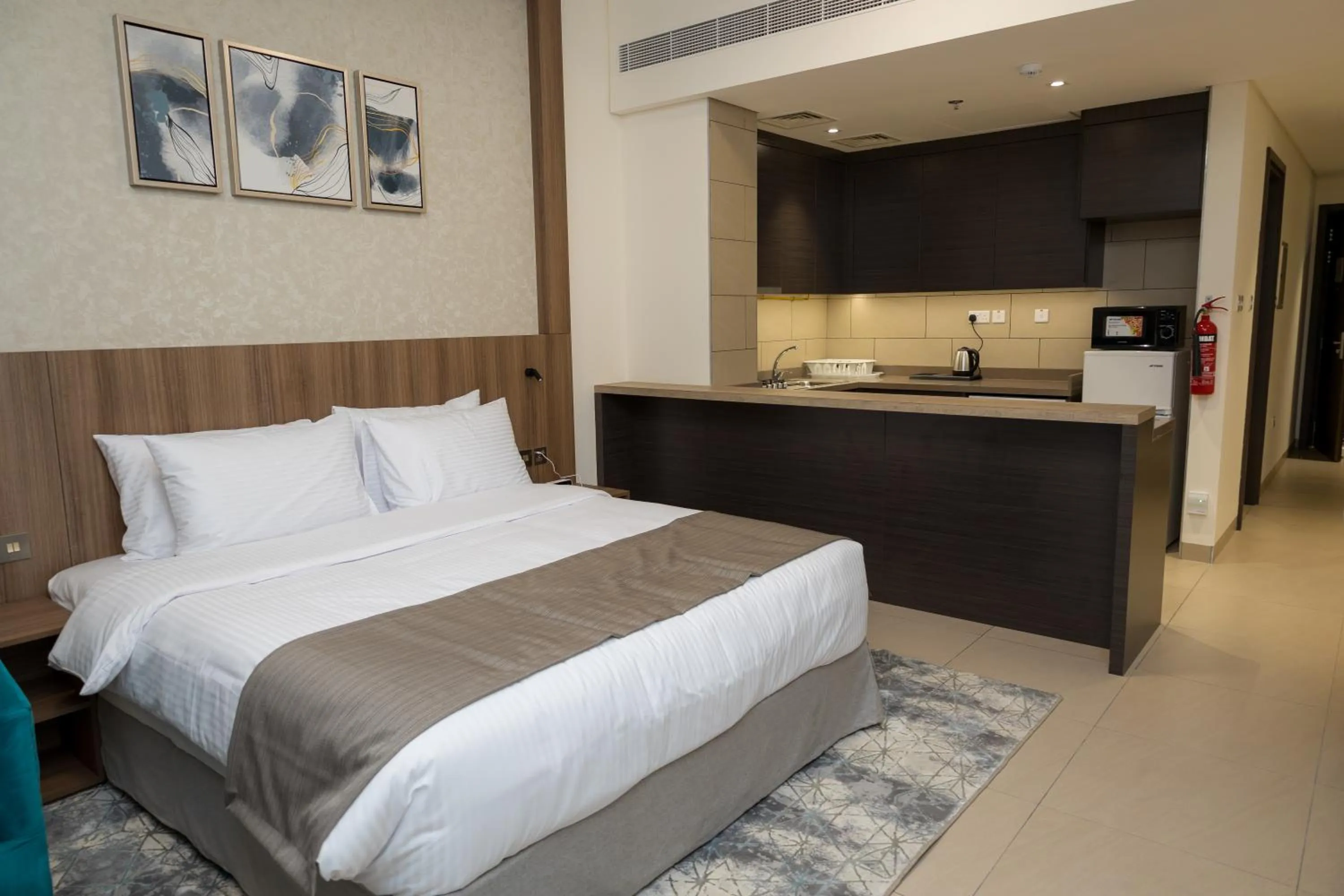 Bed in Azur Regency Hotel Apartments