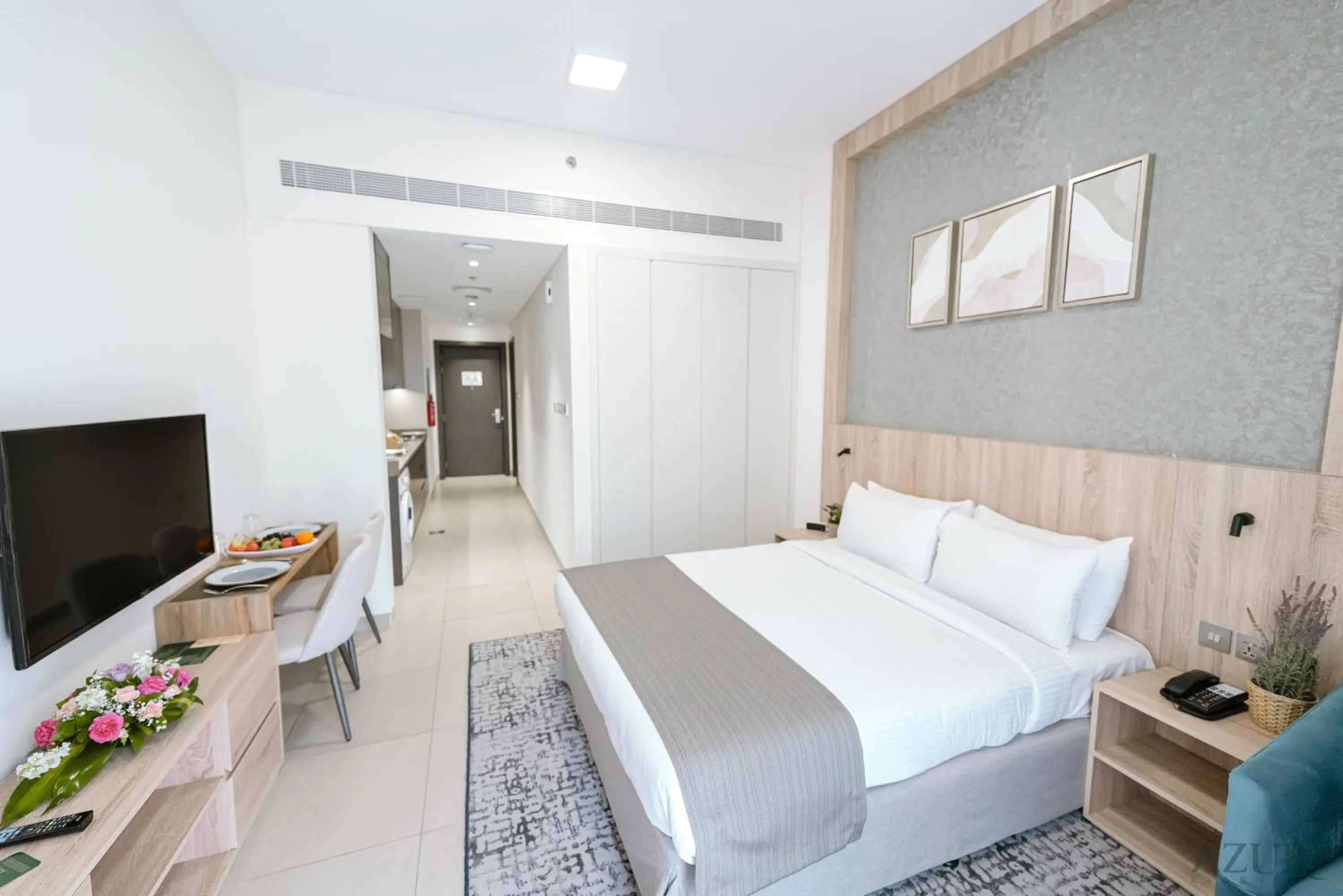 Bed in Azur Regency Hotel Apartments