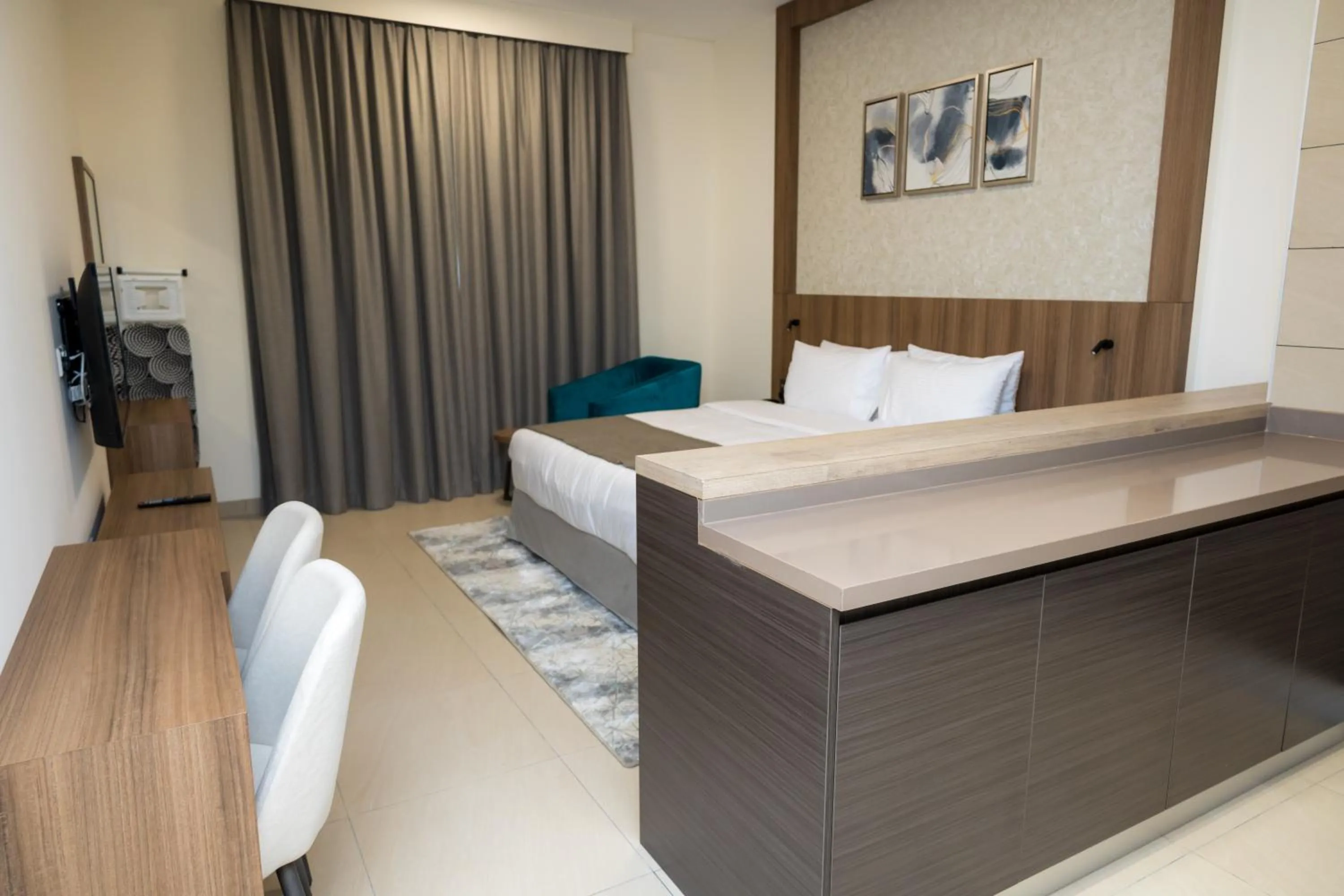 Bed in Azur Regency Hotel Apartments