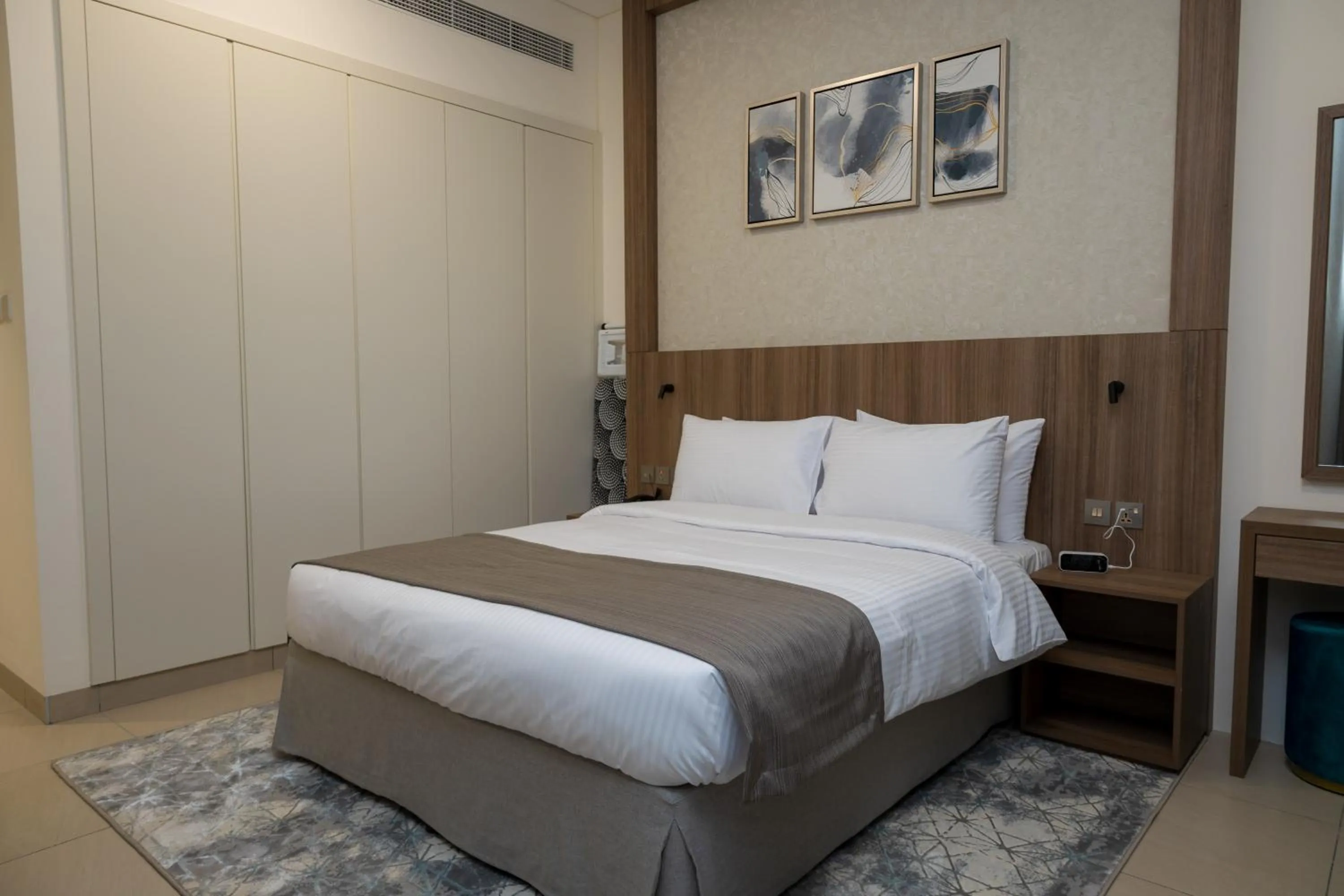 Bed in Azur Regency Hotel Apartments