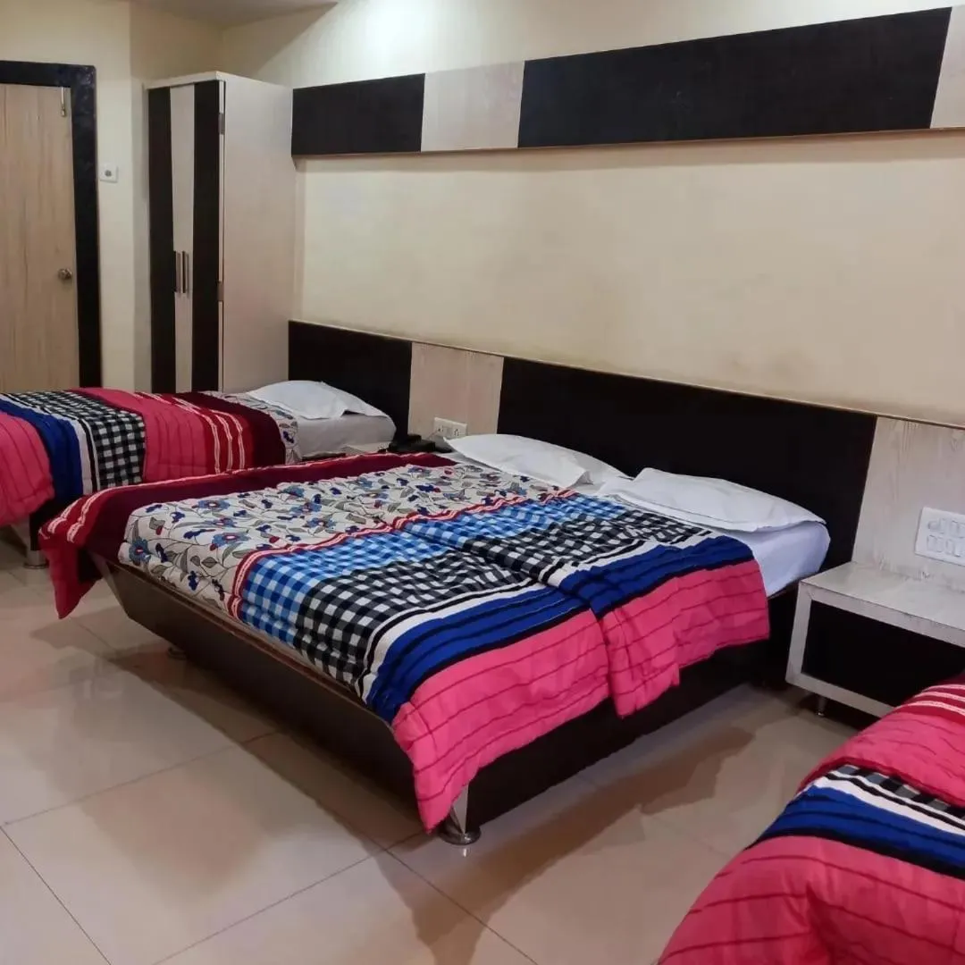 Bed in sharan hotel