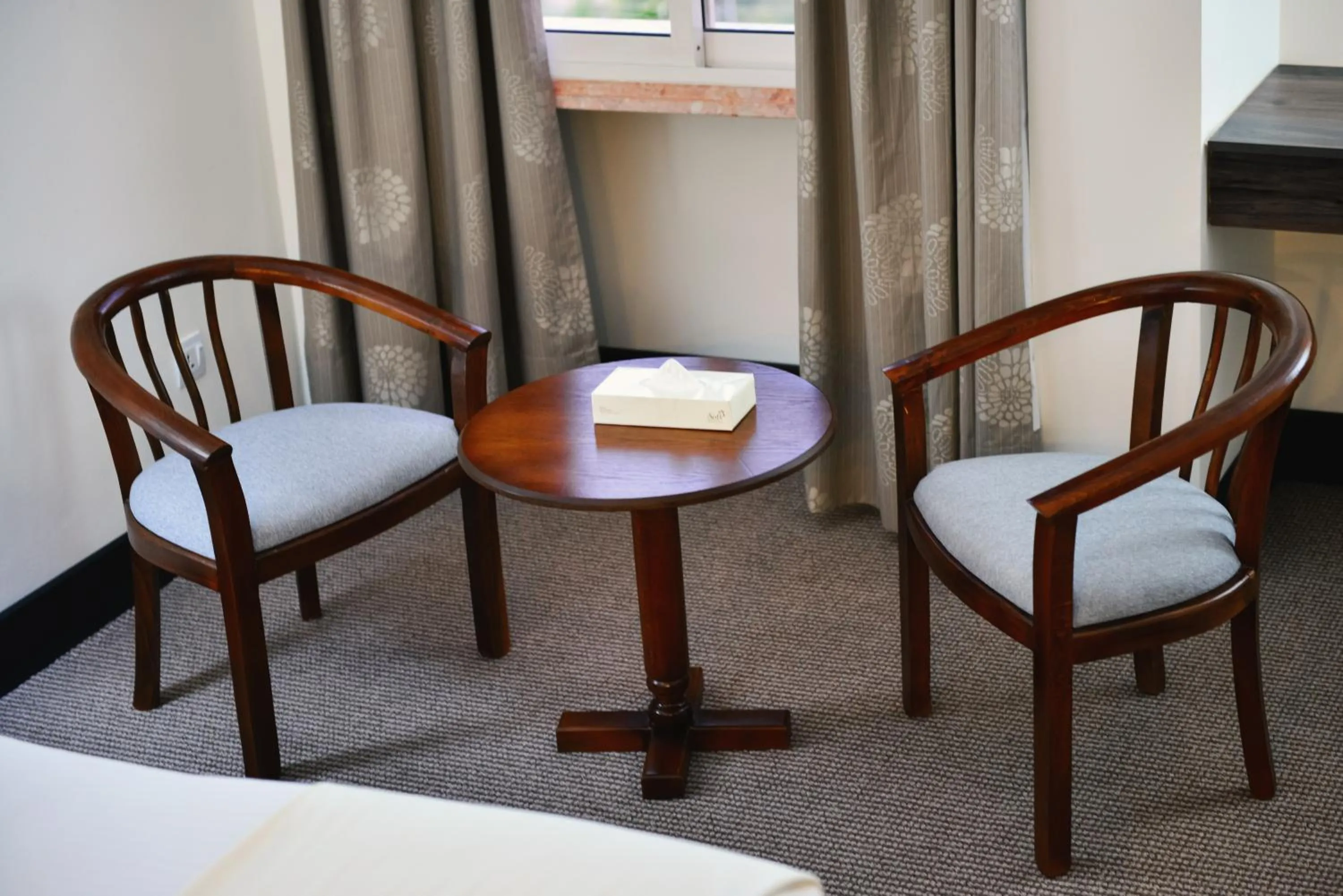 Seating area, Bed in Petra Castle Hotel