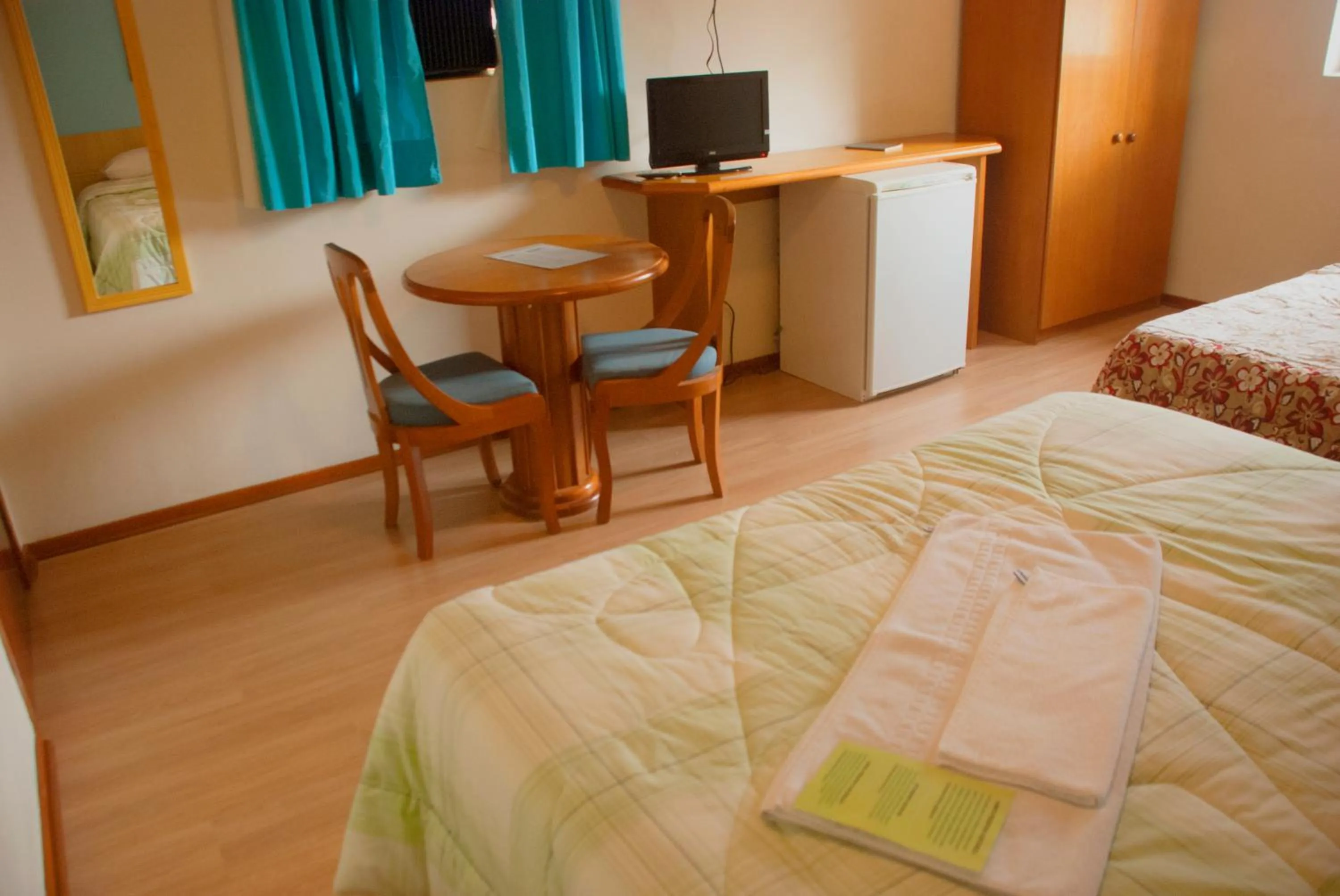 Bed in Hara Palace Hotel