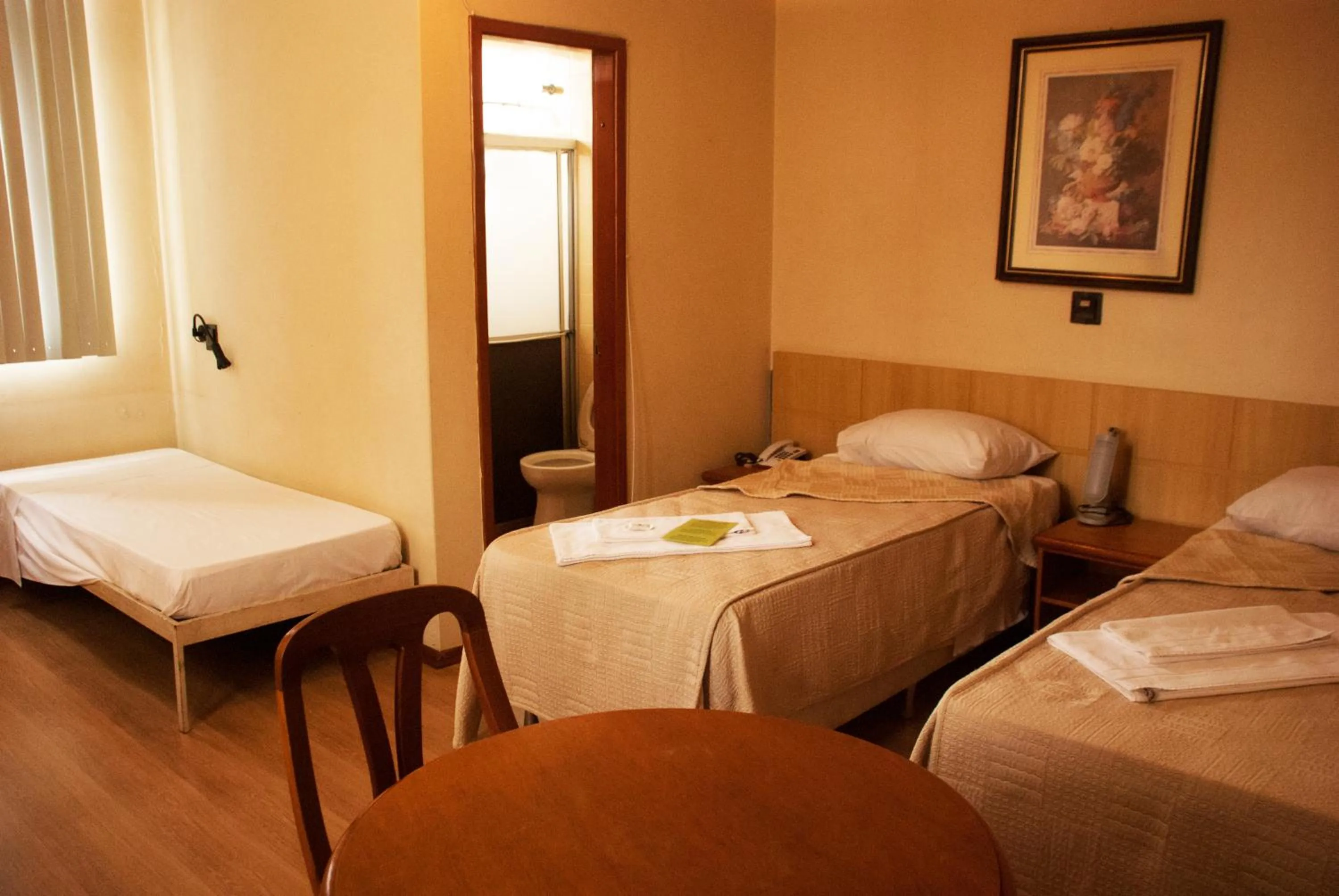 Bed in Hara Palace Hotel