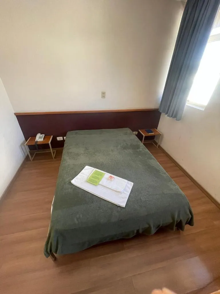 Bed in Hara Palace Hotel