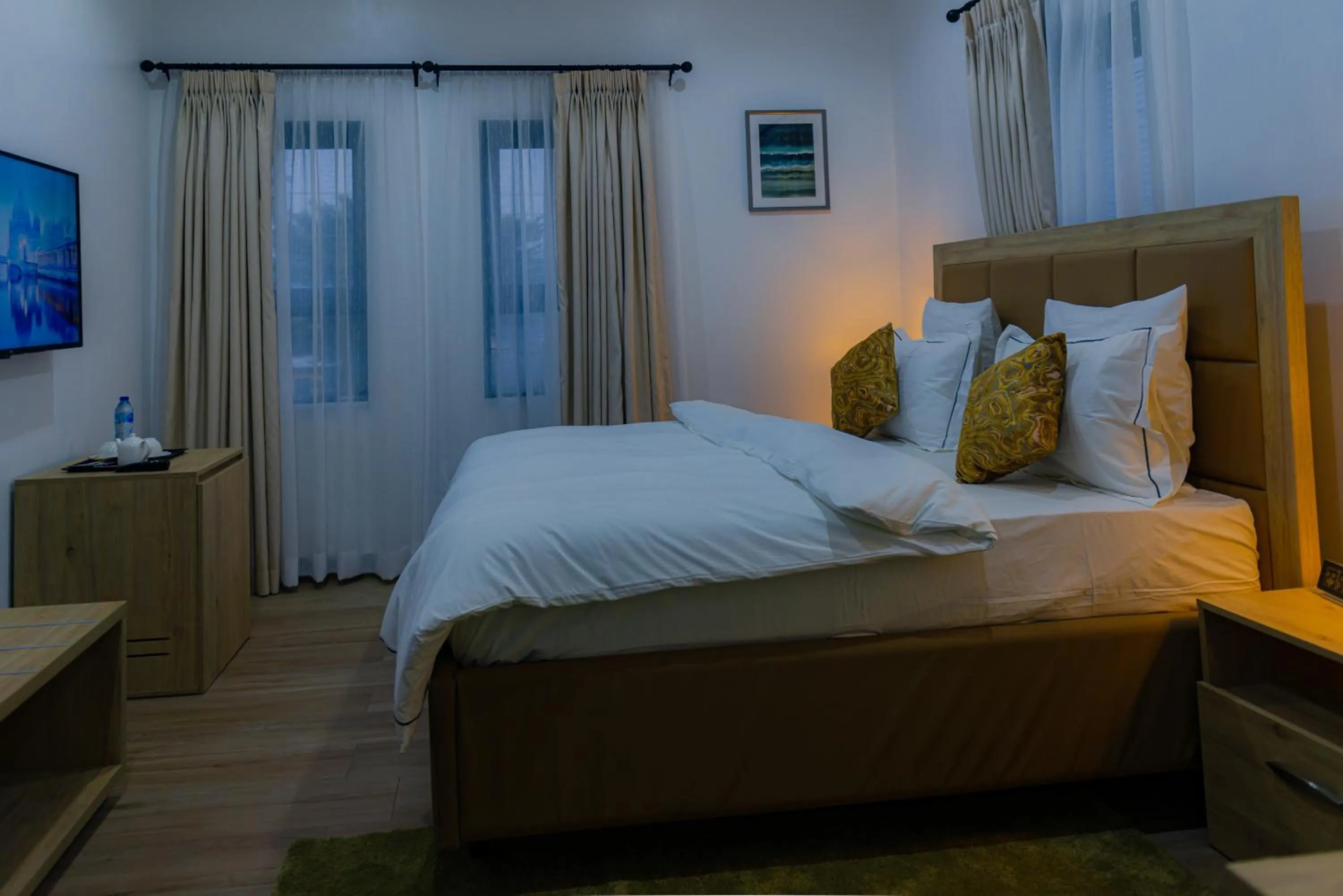 Bed in Quest Boutique Hotel