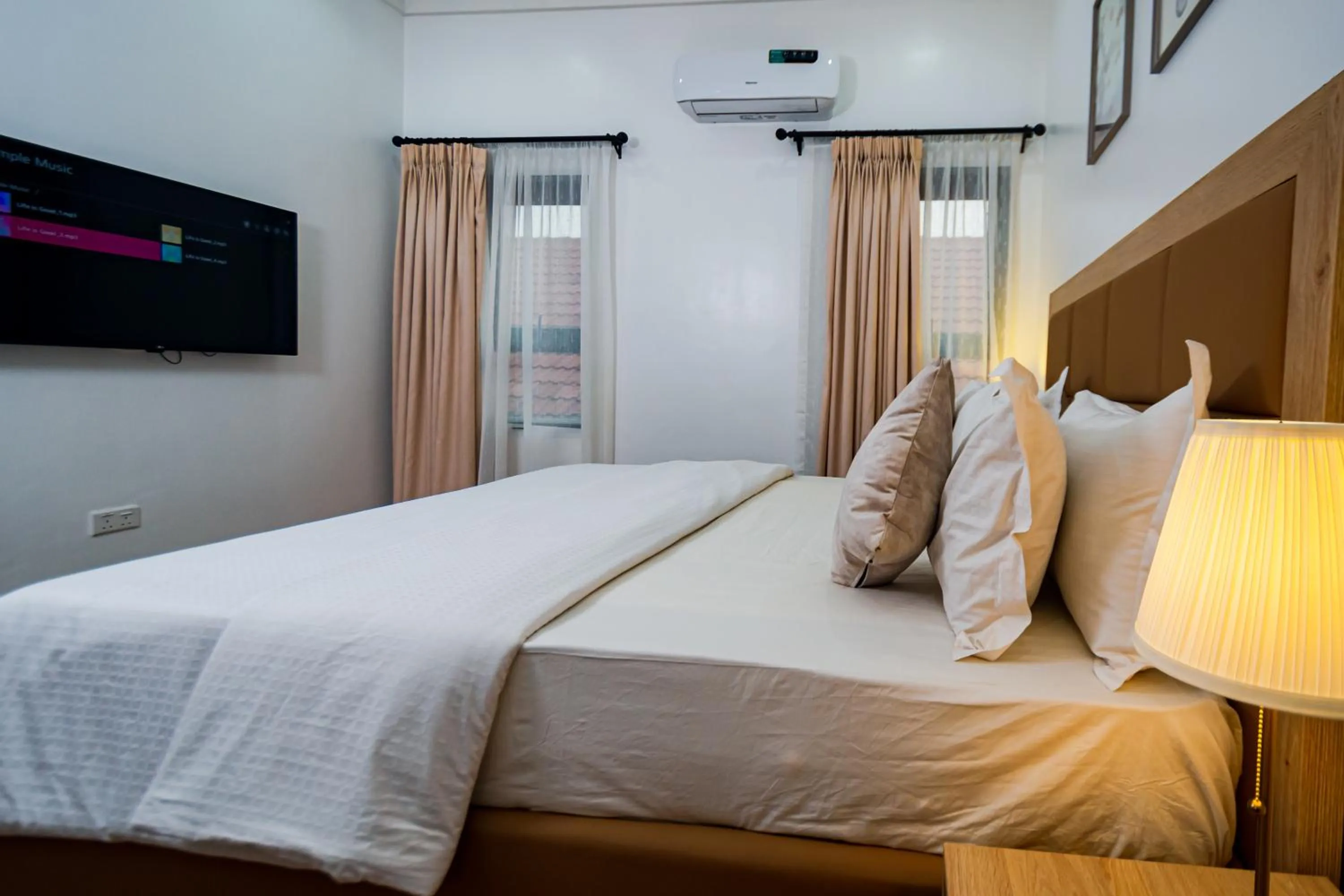 Bed in Quest Boutique Hotel