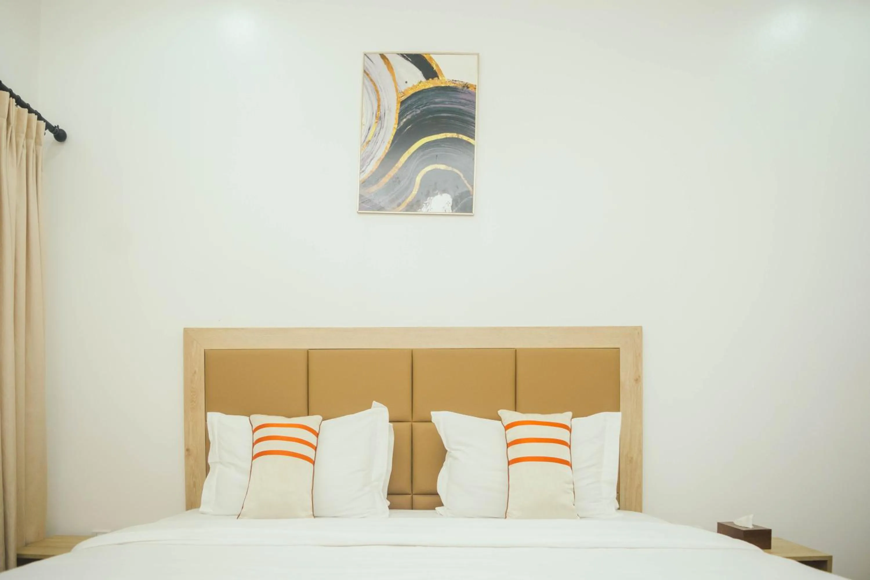 Bed in Quest Boutique Hotel