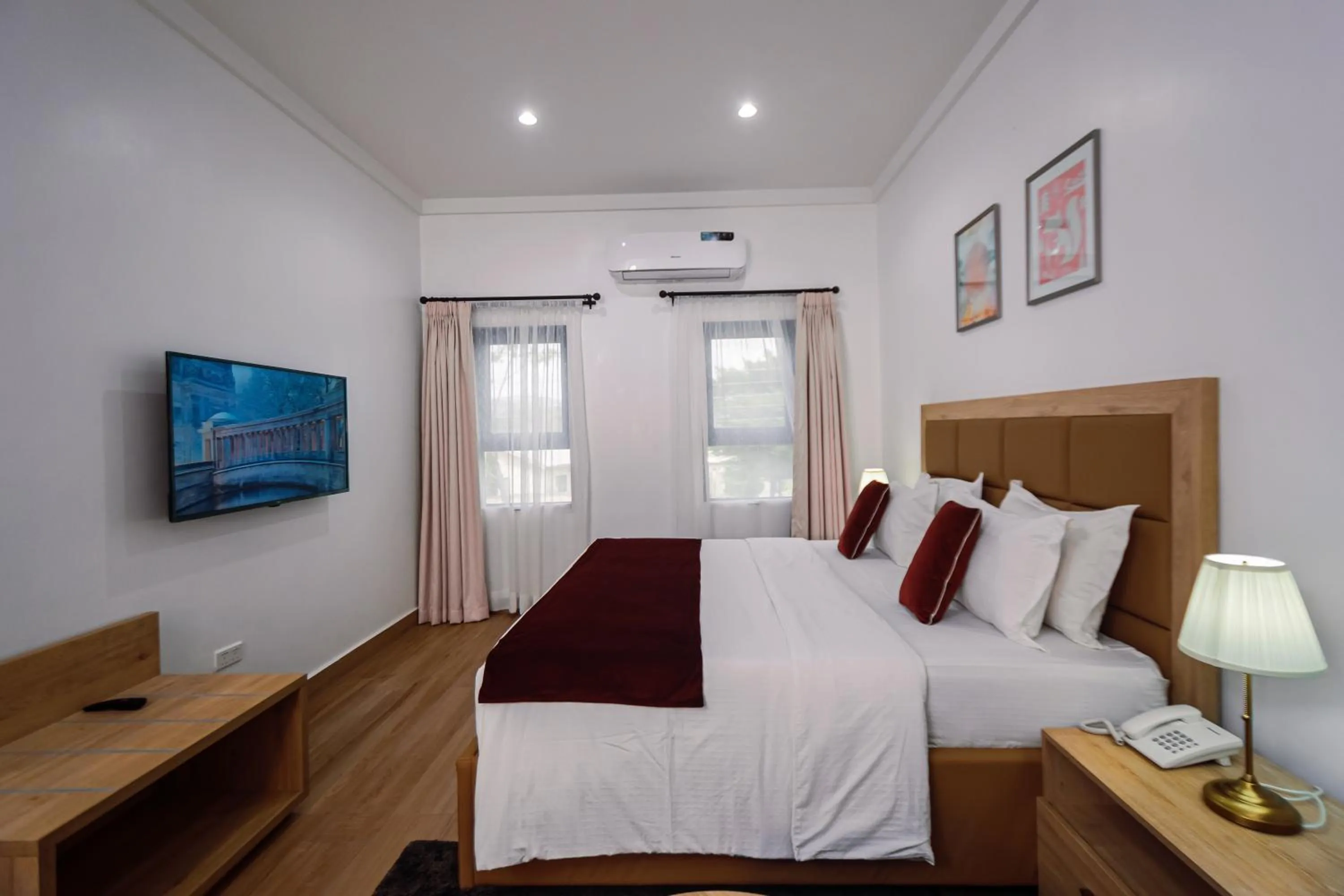 Bed in Quest Boutique Hotel