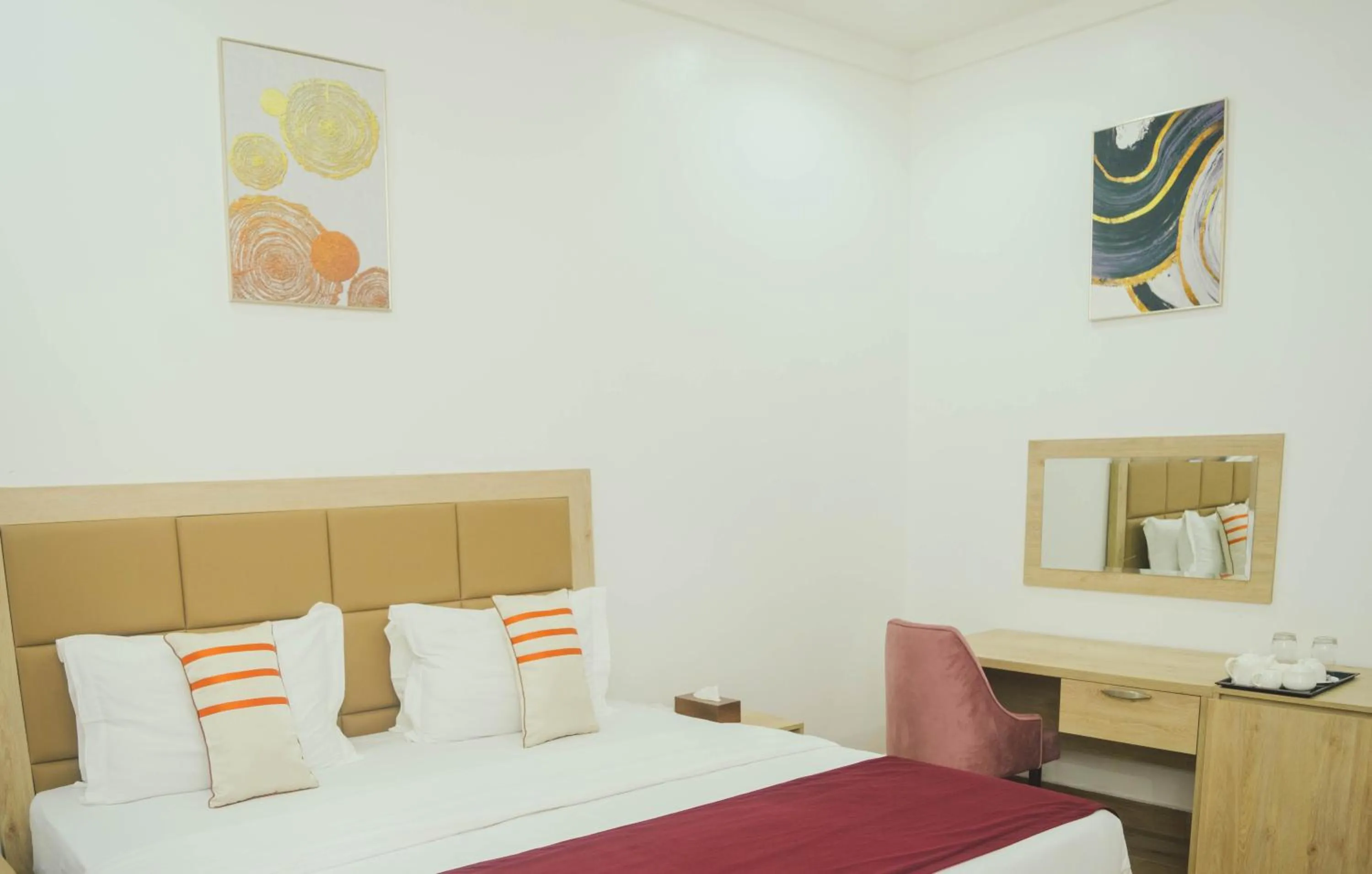 Bed in Quest Boutique Hotel