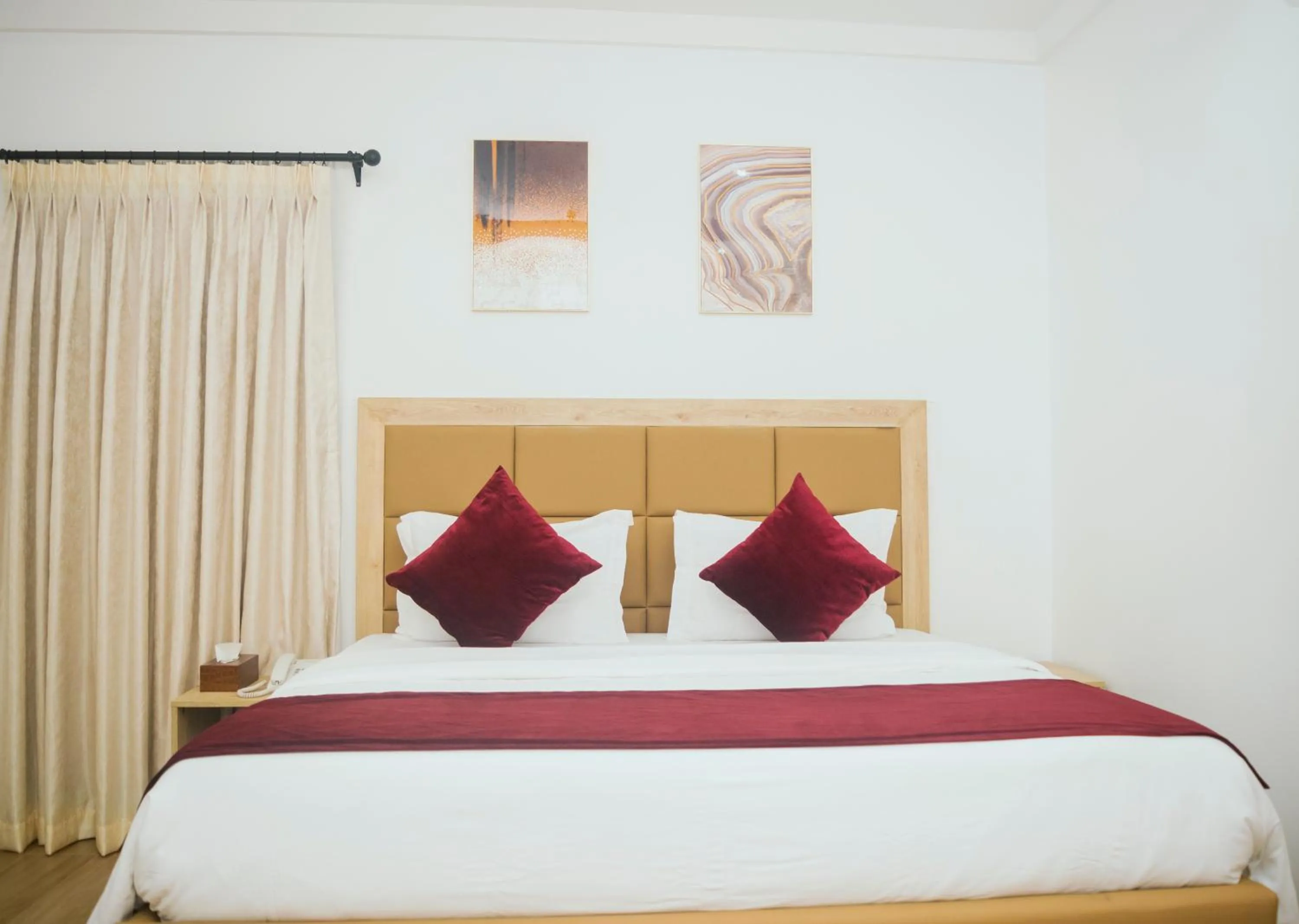 Bed in Quest Boutique Hotel