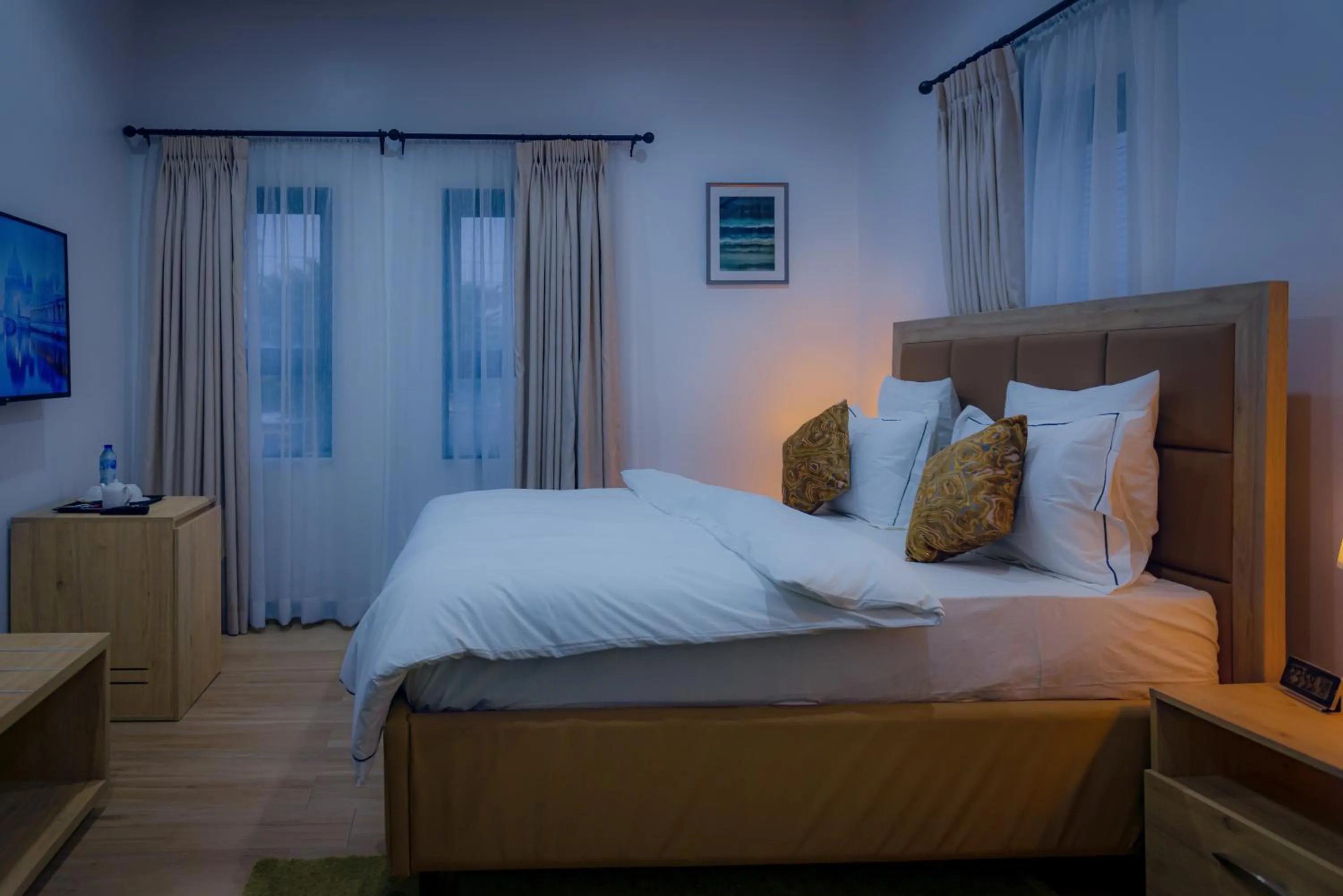 Bed in Quest Boutique Hotel