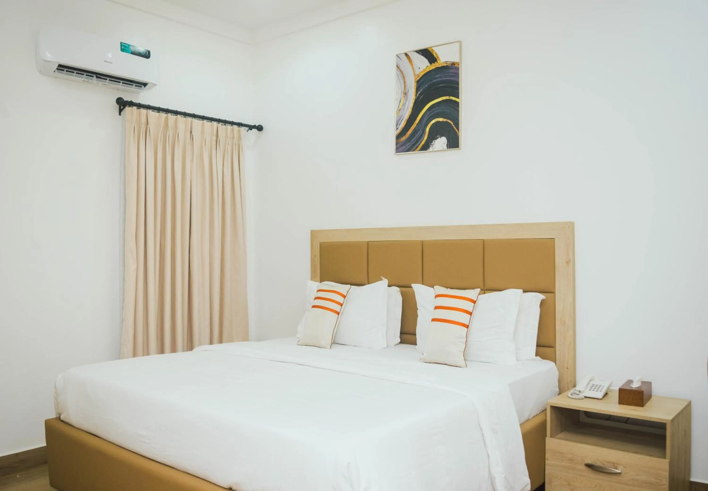 Bed in Quest Boutique Hotel