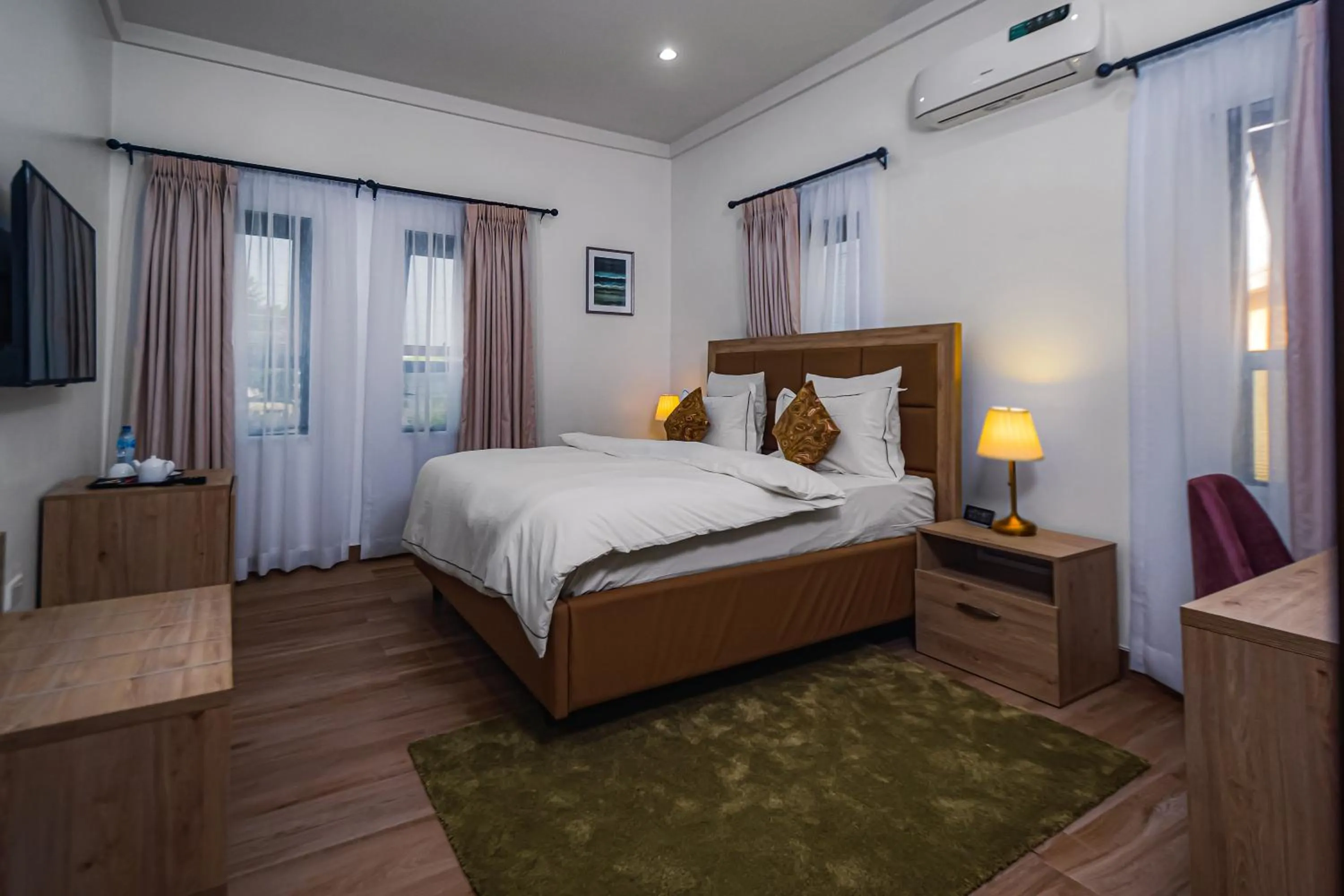 Bed in Quest Boutique Hotel