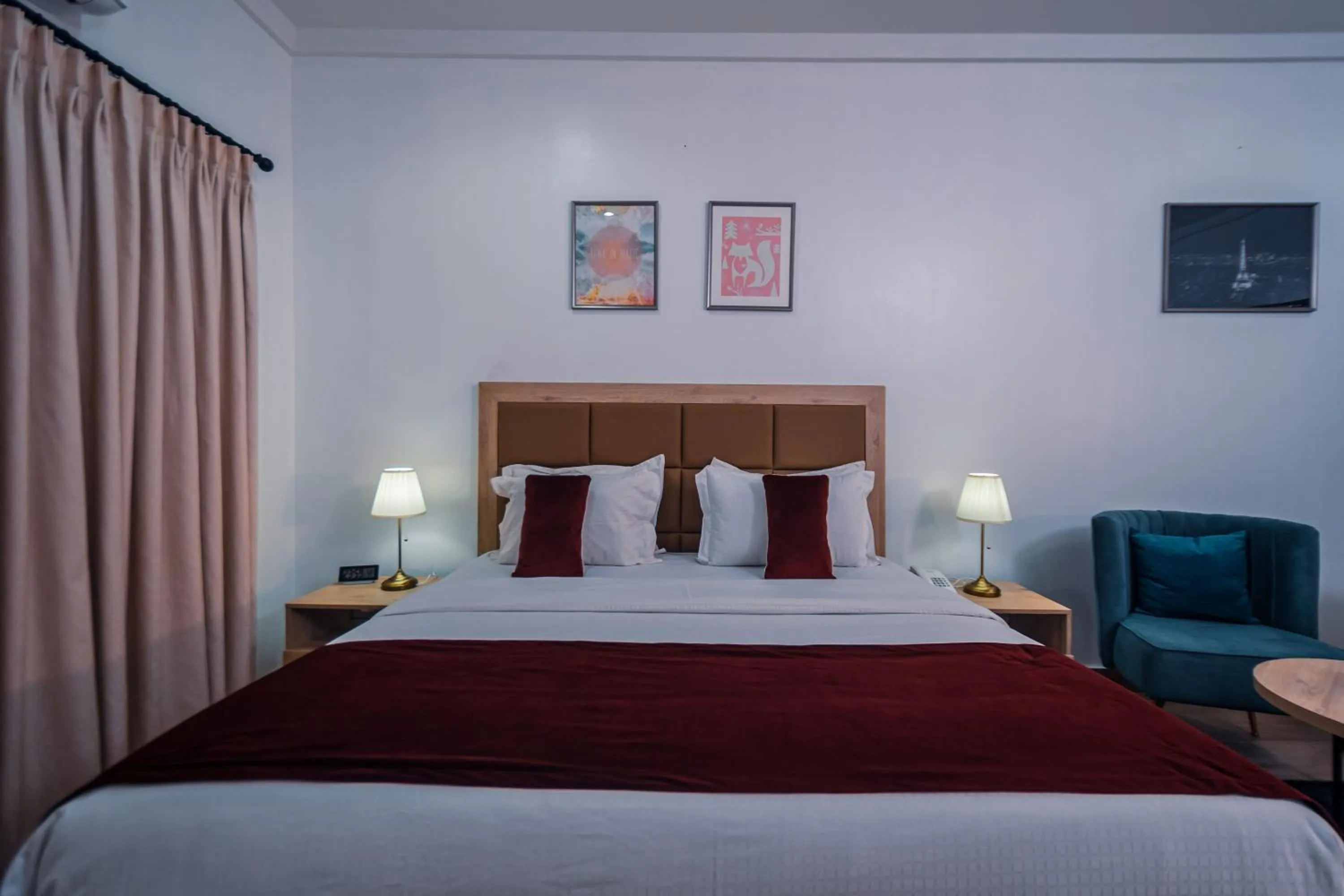 Bed in Quest Boutique Hotel