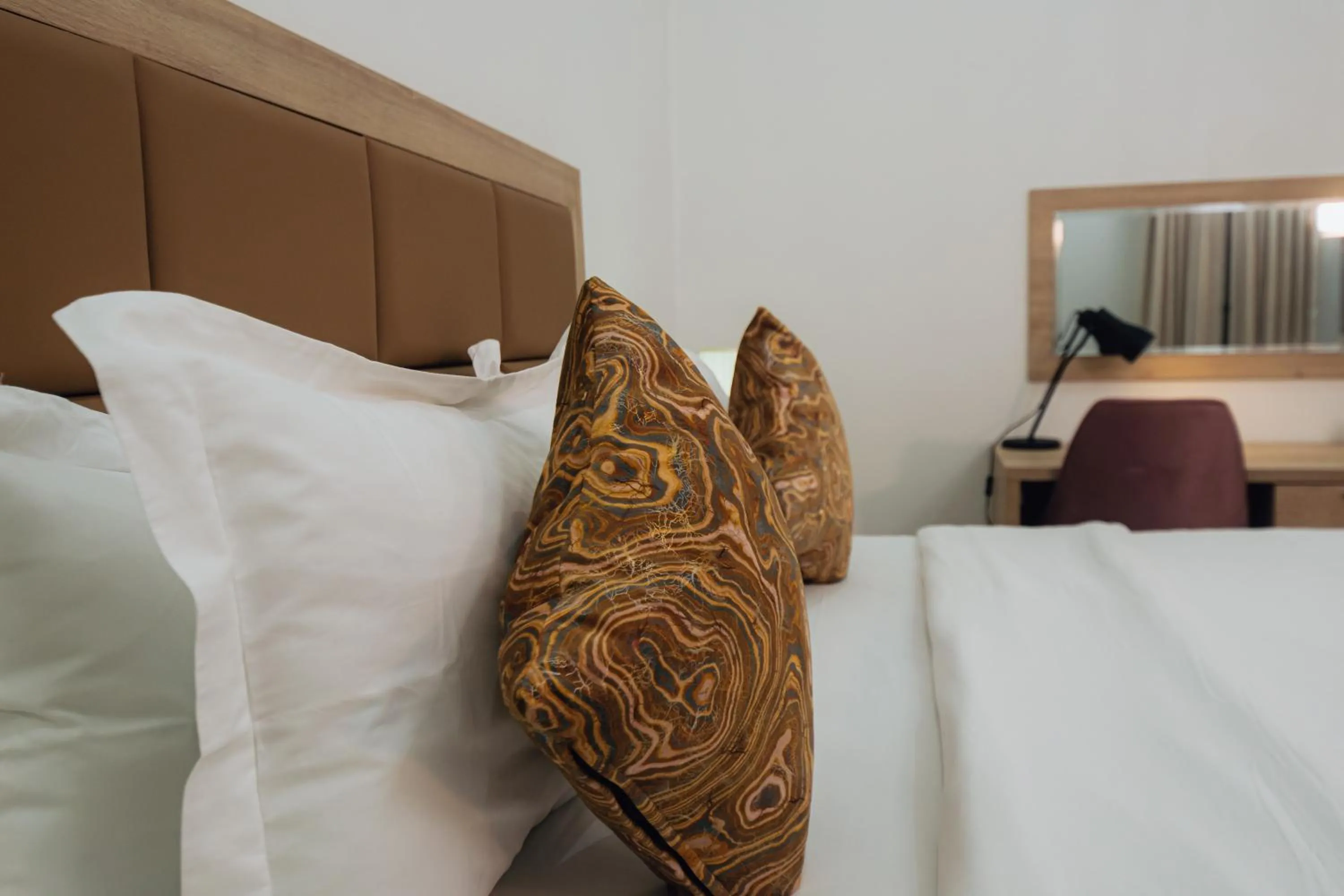 Bed in Quest Boutique Hotel