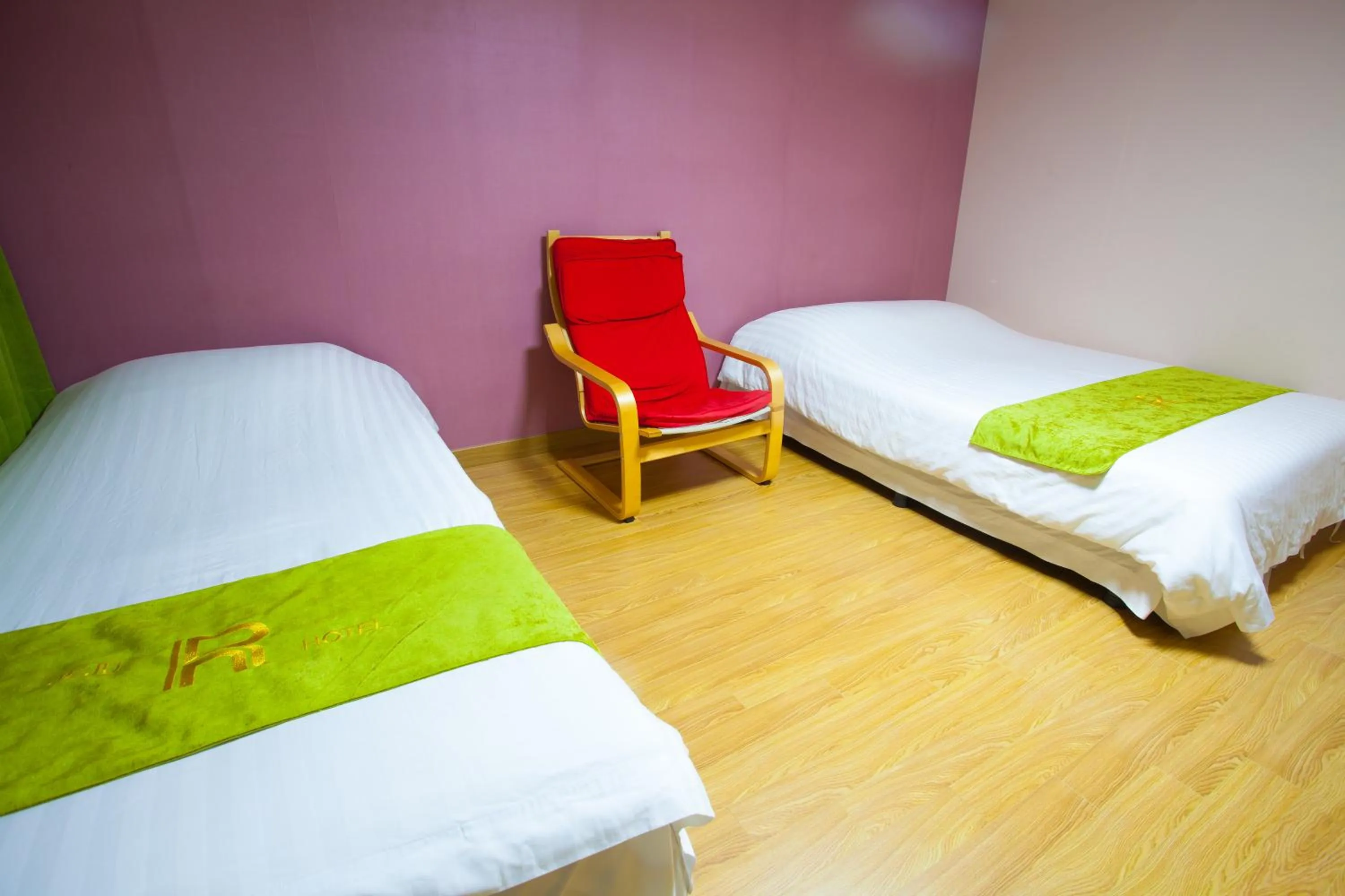 Bed in Jeju R Hotel & Guesthouse