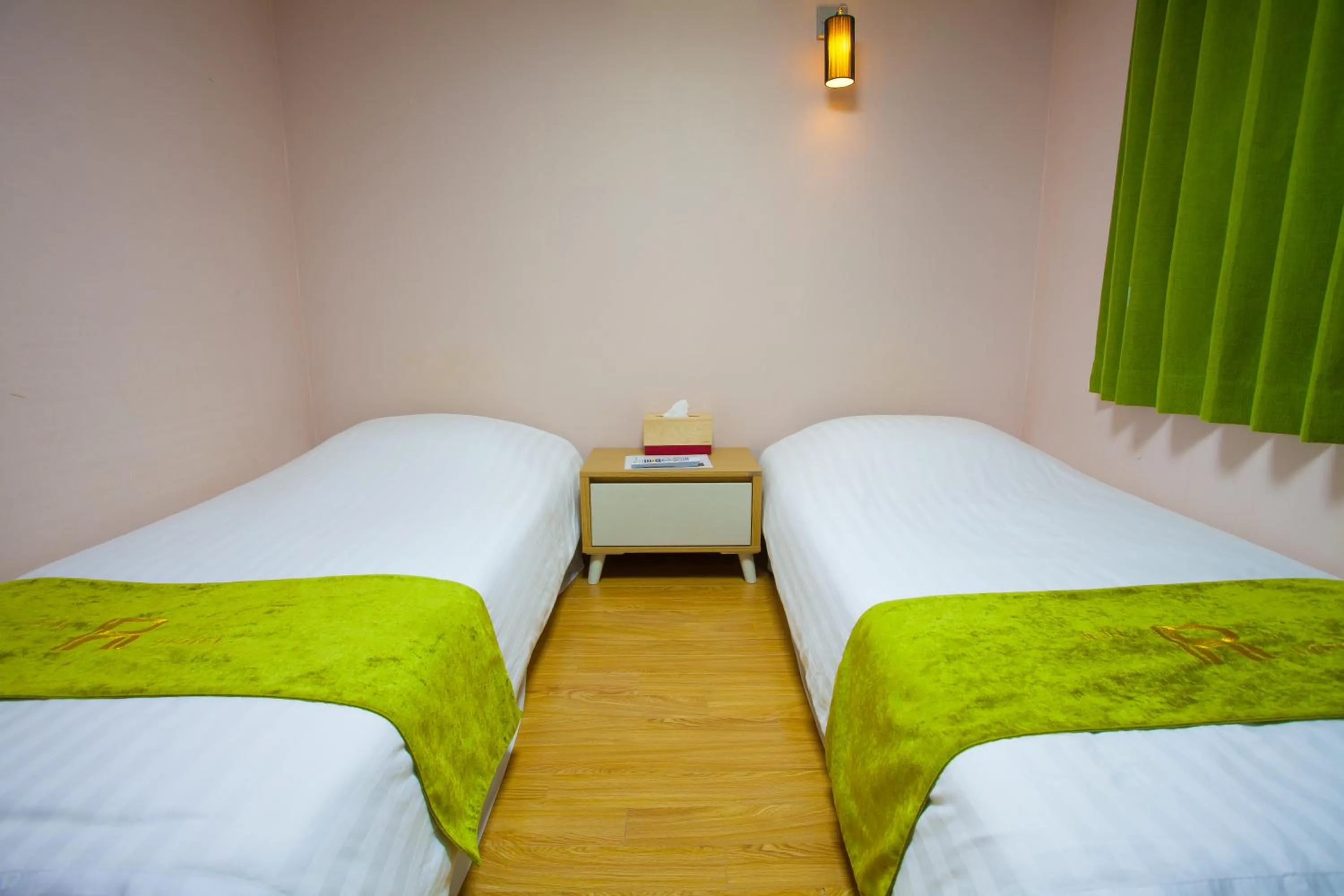 Bed in Jeju R Hotel & Guesthouse