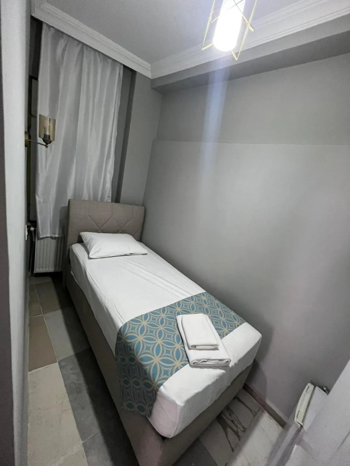 Bed in GRAND Deniz Hotel