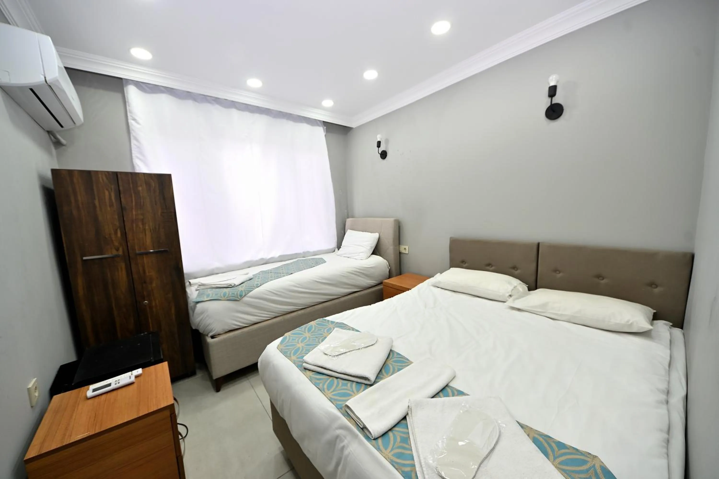 Bed in GRAND Deniz Hotel
