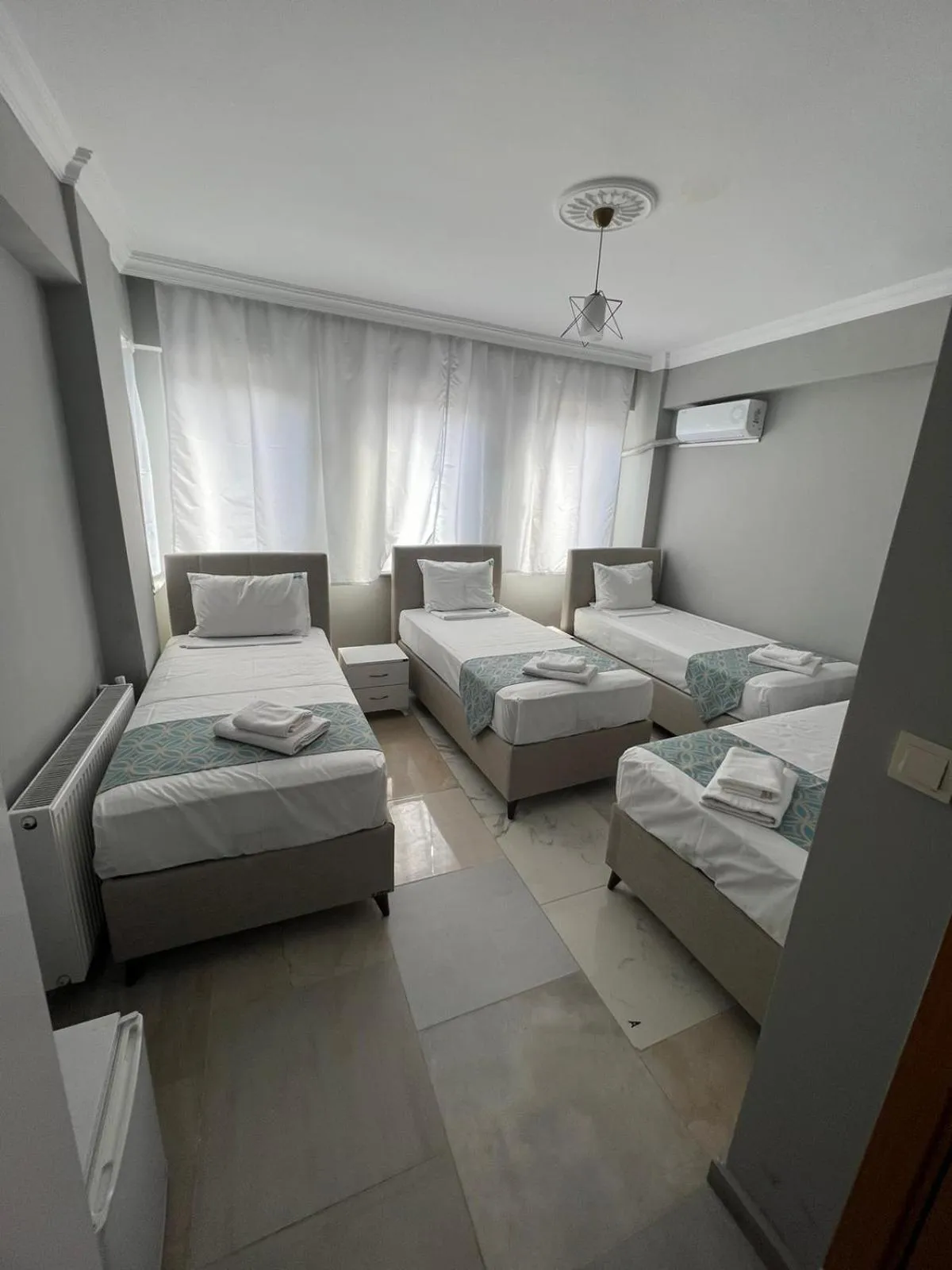 Bed in GRAND Deniz Hotel