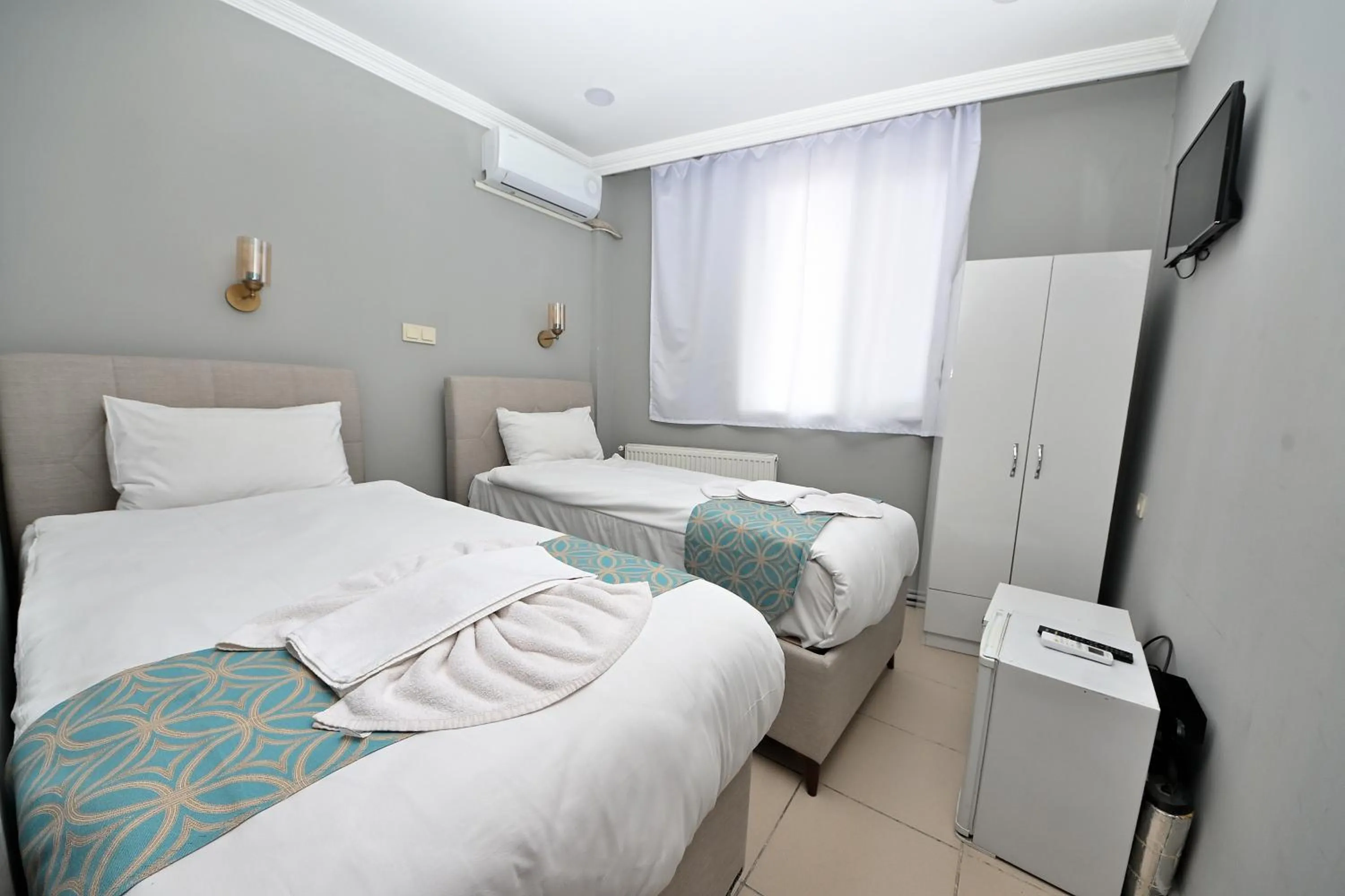 Bed in GRAND Deniz Hotel