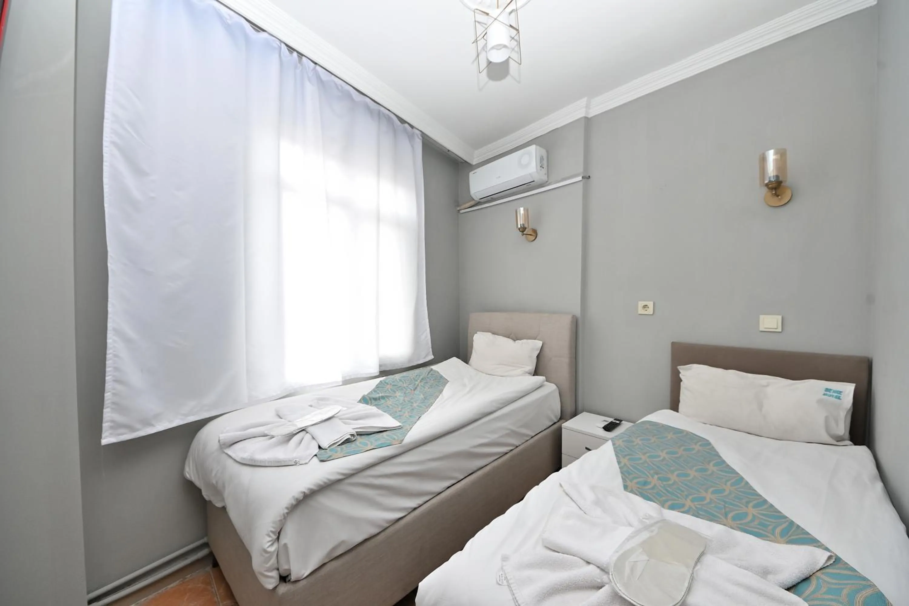 Bed in GRAND Deniz Hotel