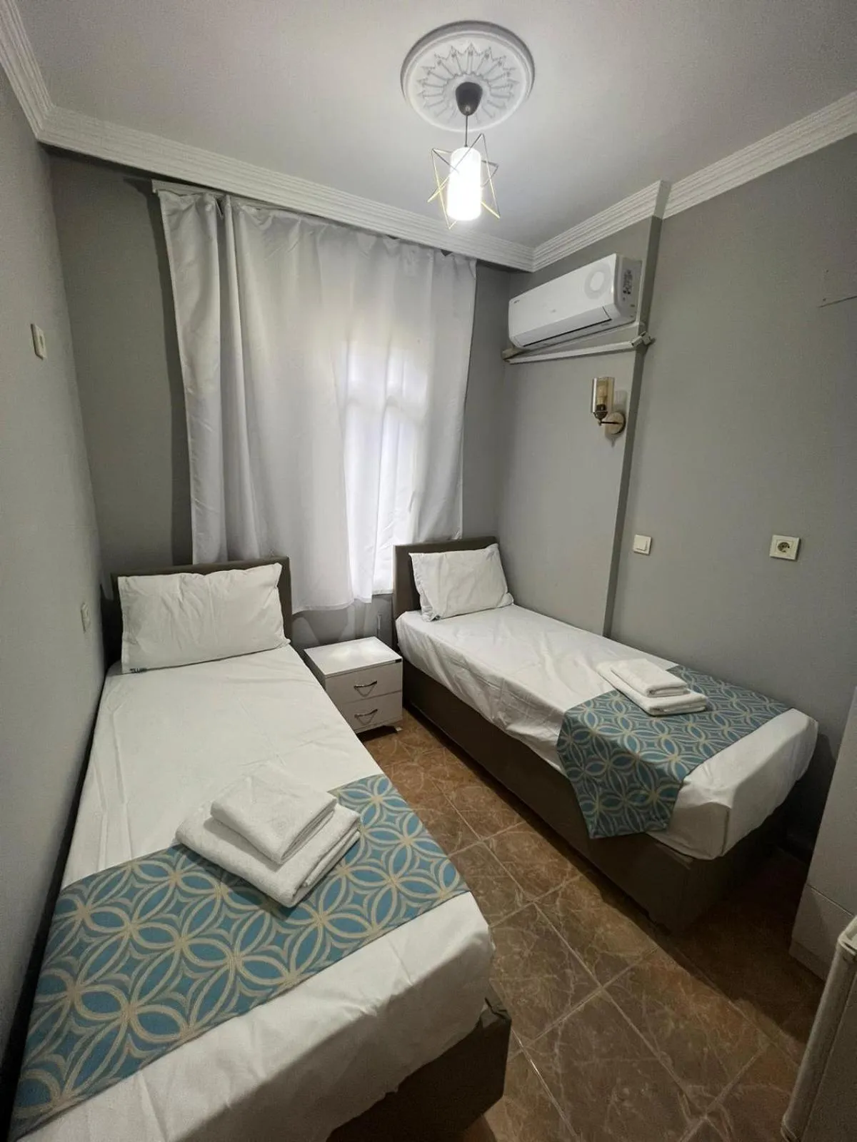 Bed in GRAND Deniz Hotel