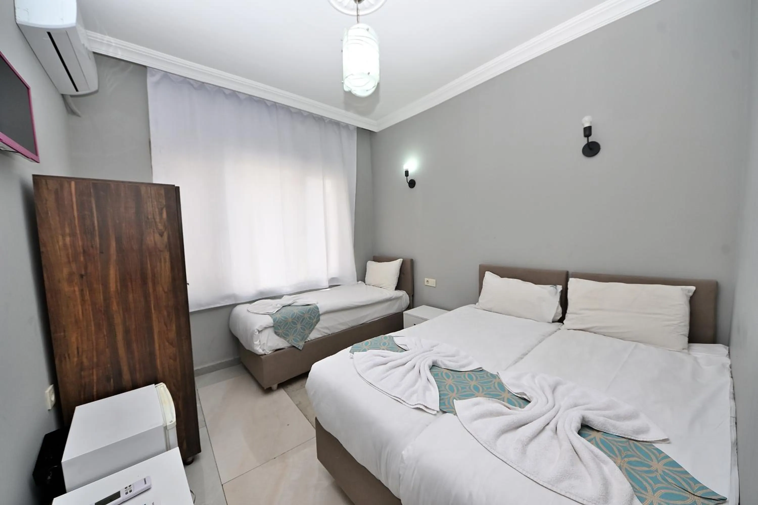 Bed in GRAND Deniz Hotel