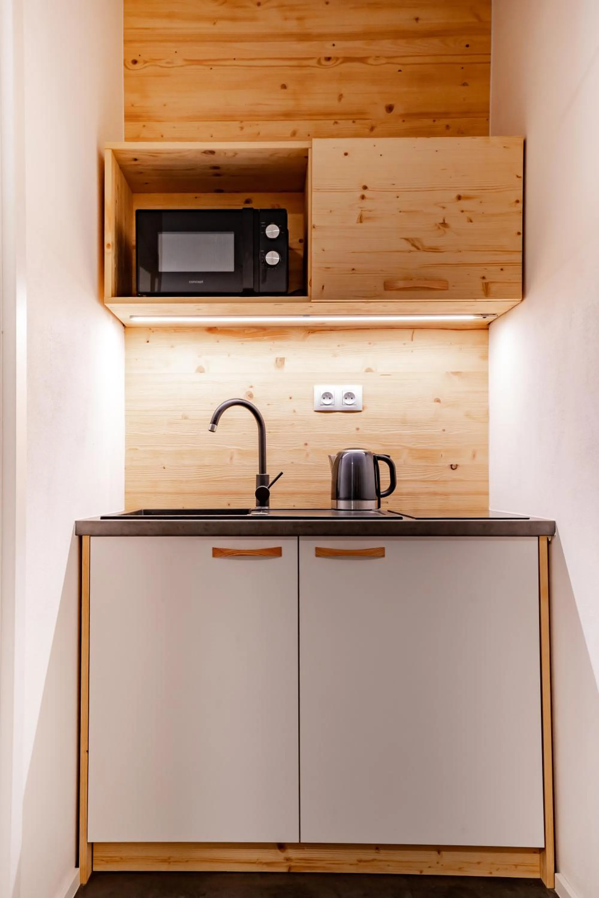 Kitchen or kitchenette in Apartmány NONE