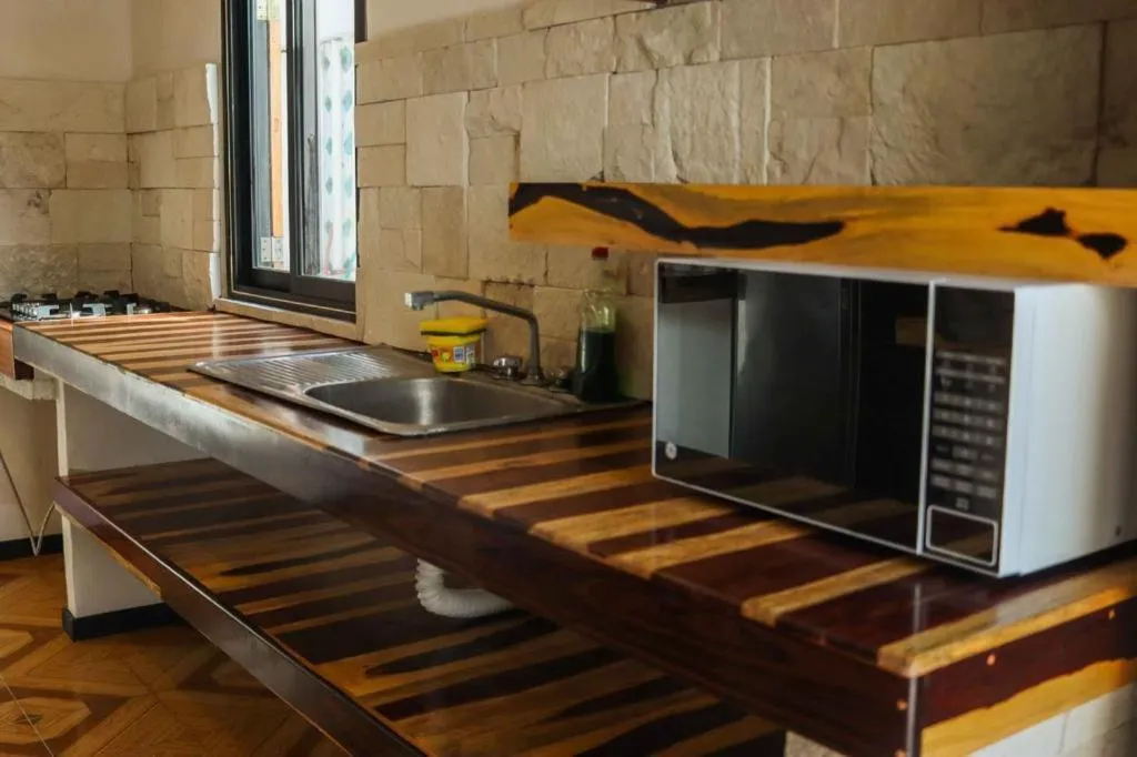 Kitchen or kitchenette in Casa Mate BeachFront HOUSES El Cuyo