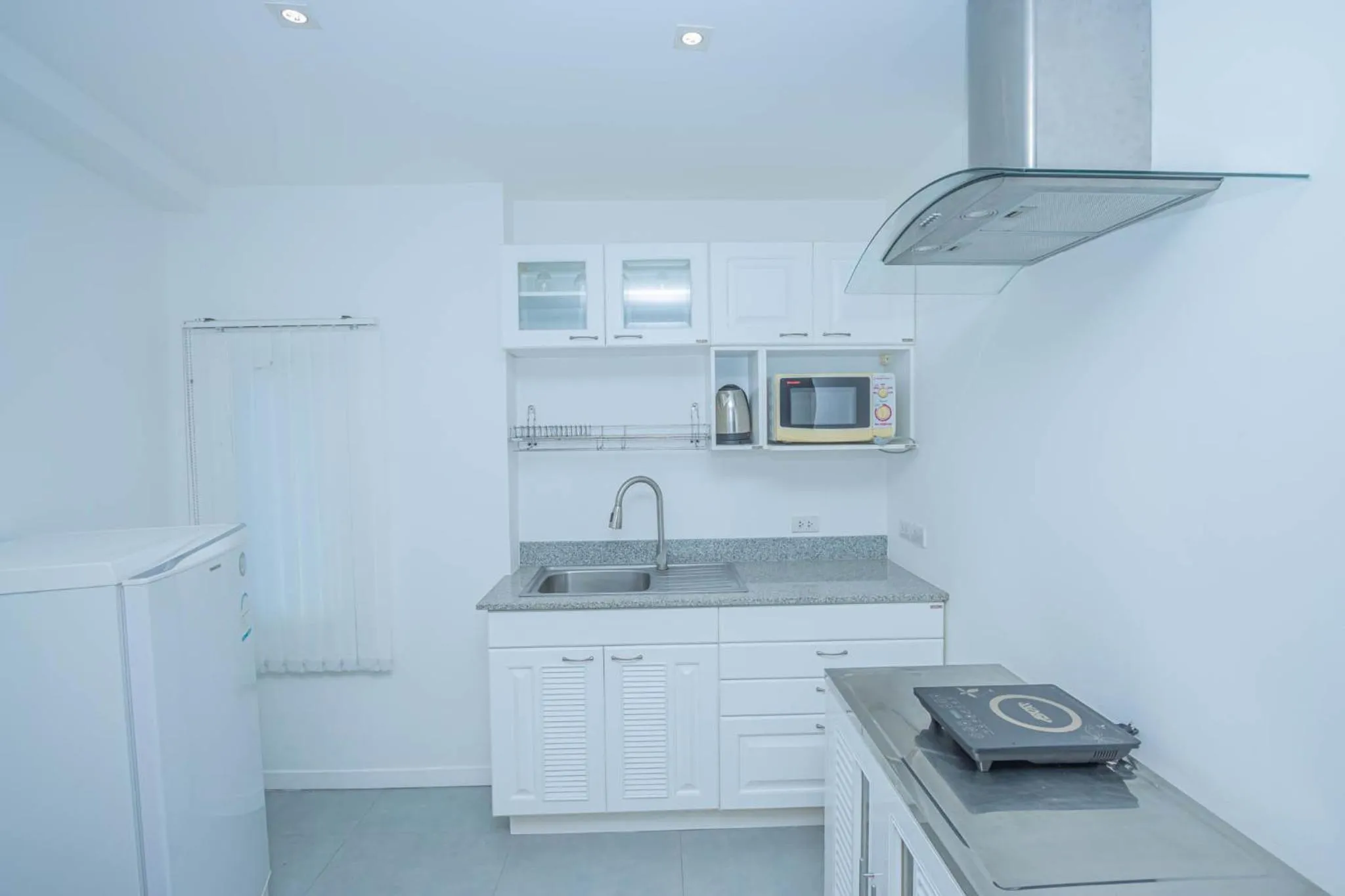 Kitchen or kitchenette in Utopia Kata By RoomQuest