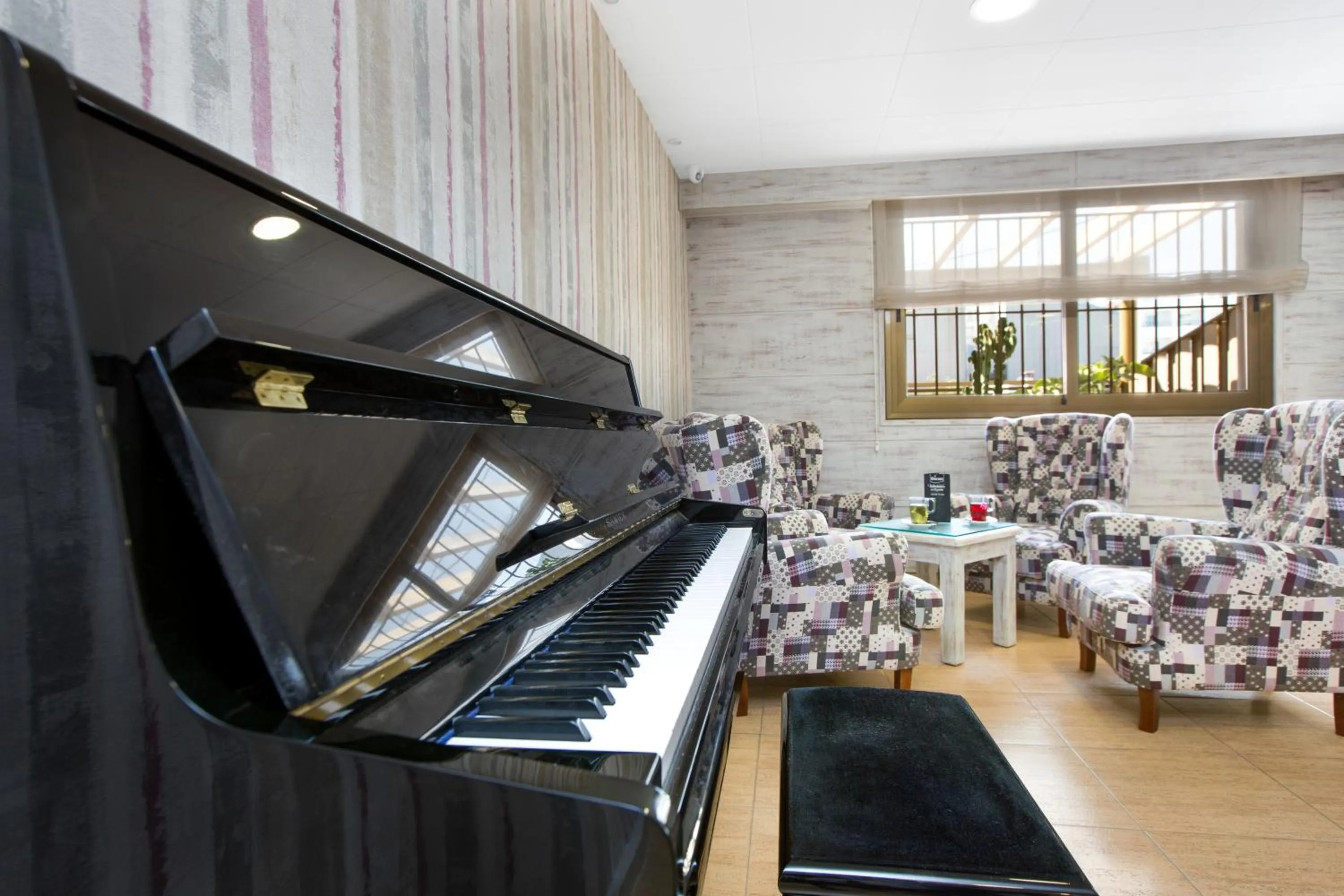 Communal lounge/ TV room in Sumus Hotel Stella and Spa 4S Adults Recommended