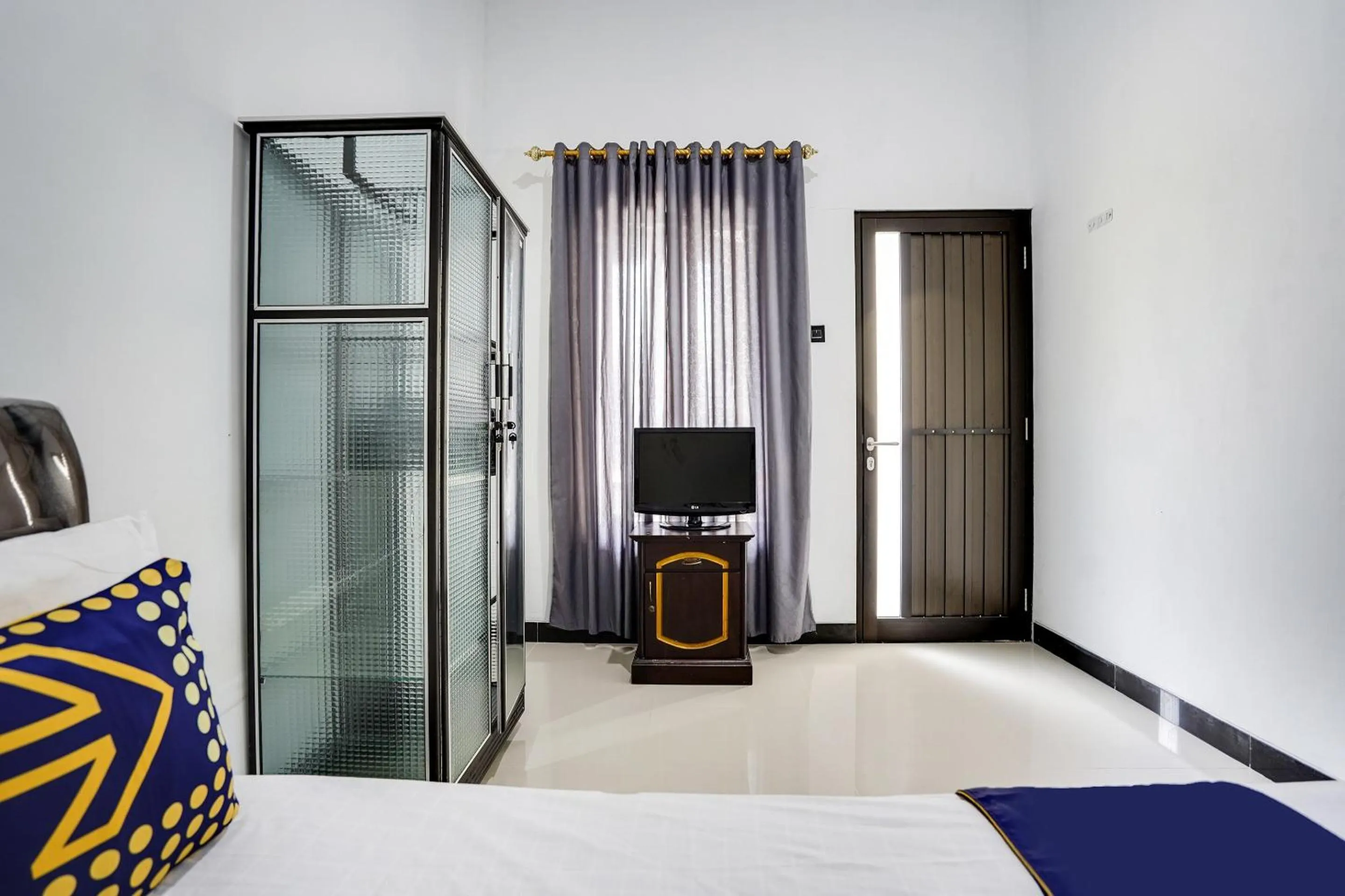 Bedroom in Hotel O Rumah Kost Gresik Syariah