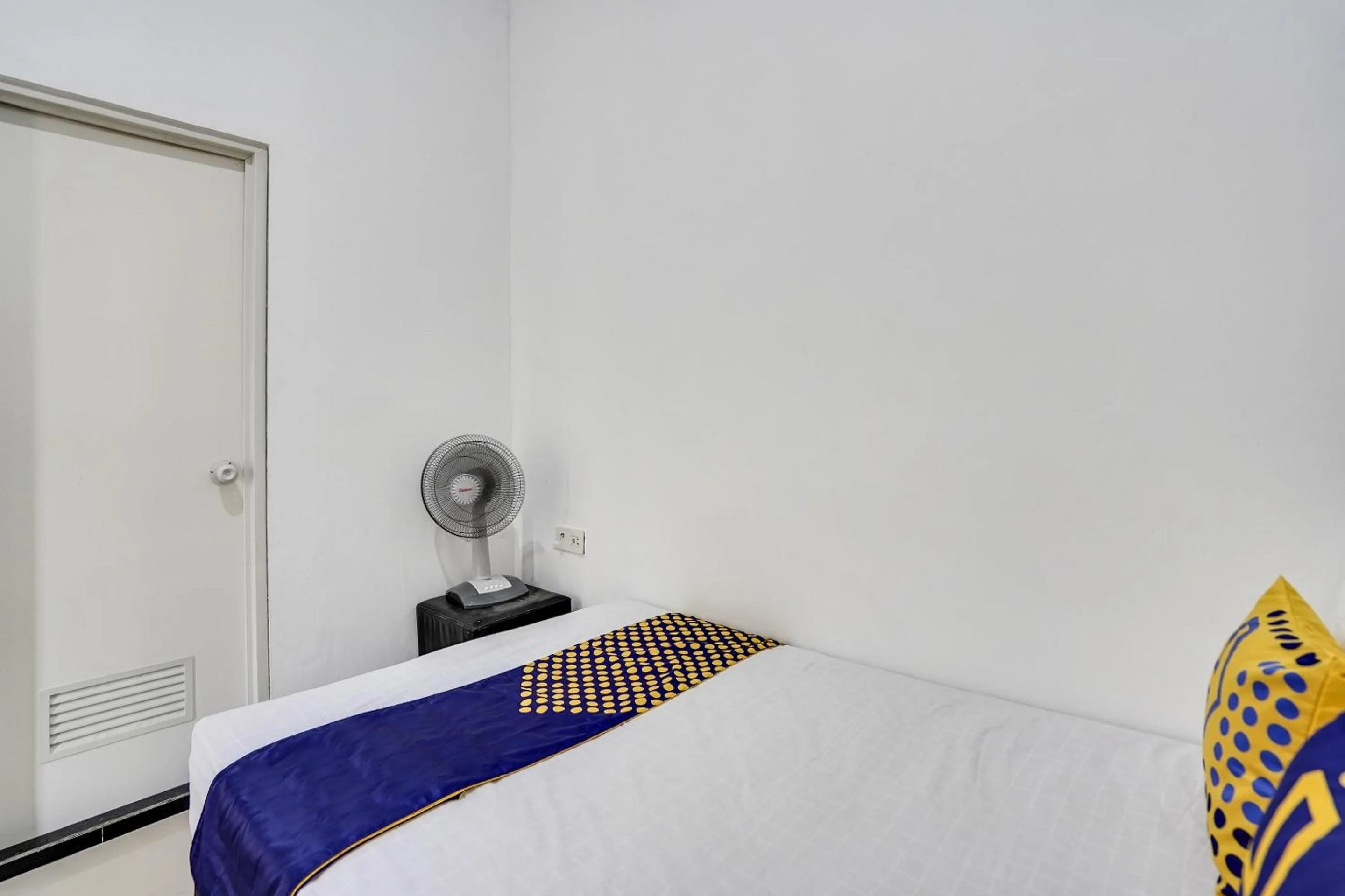 Bedroom in Hotel O Rumah Kost Gresik Syariah