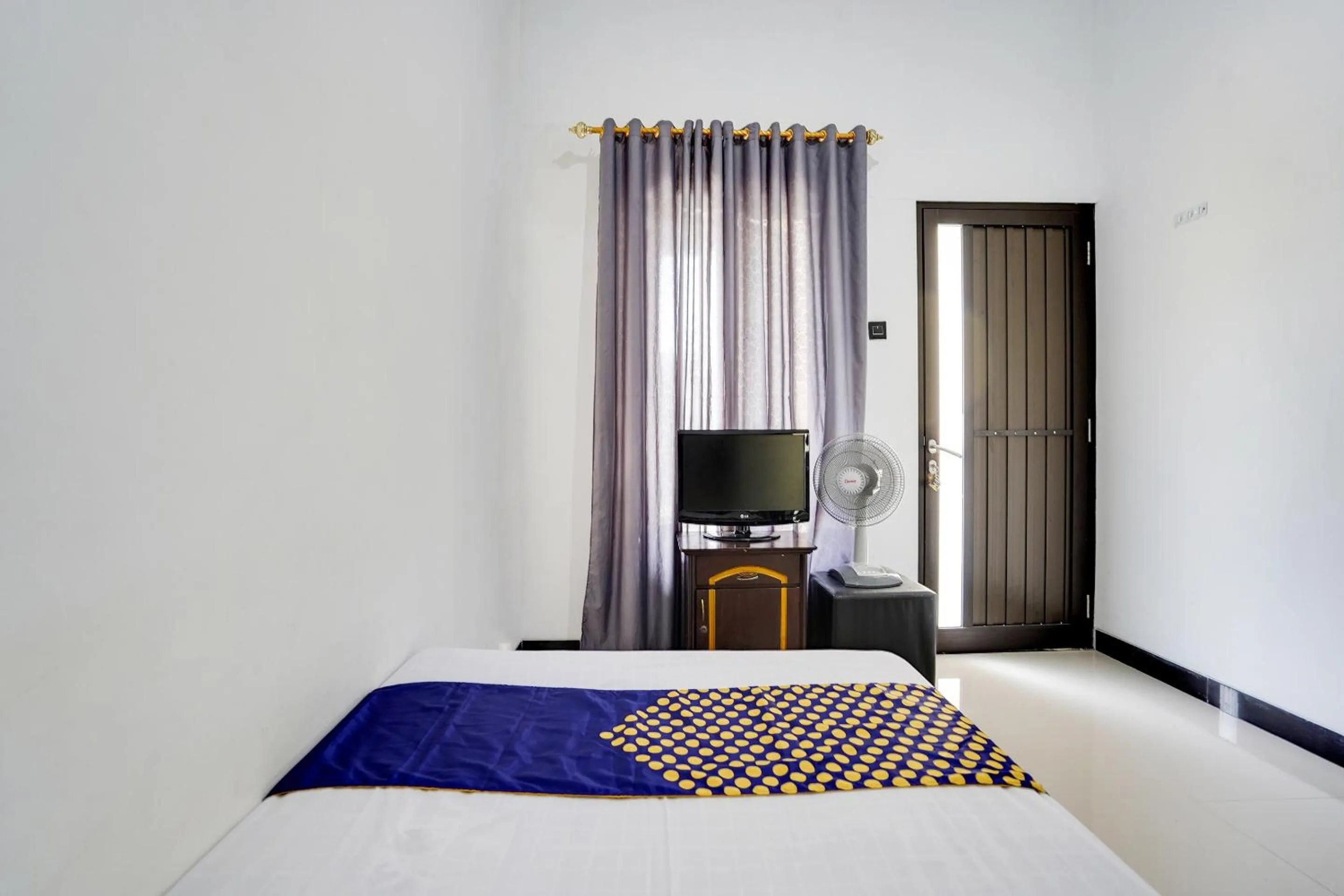 Bedroom in Hotel O Rumah Kost Gresik Syariah