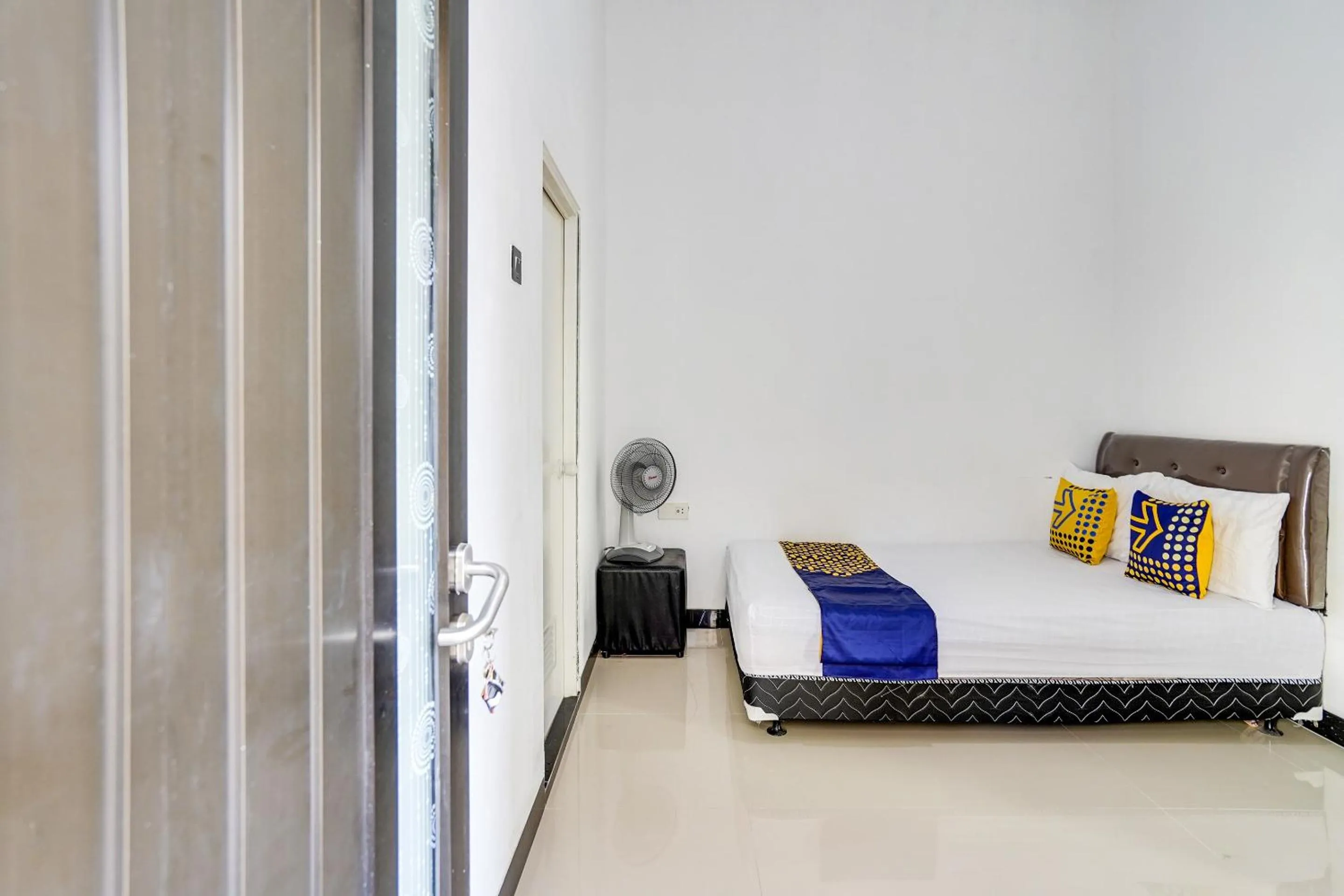 Bedroom in Hotel O Rumah Kost Gresik Syariah