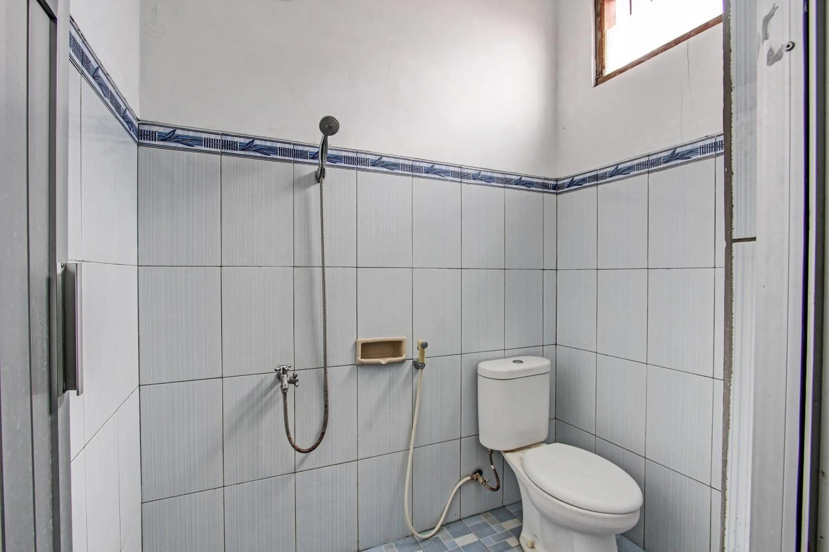 Bathroom in Hotel O Wisma Pkpri Purworejo