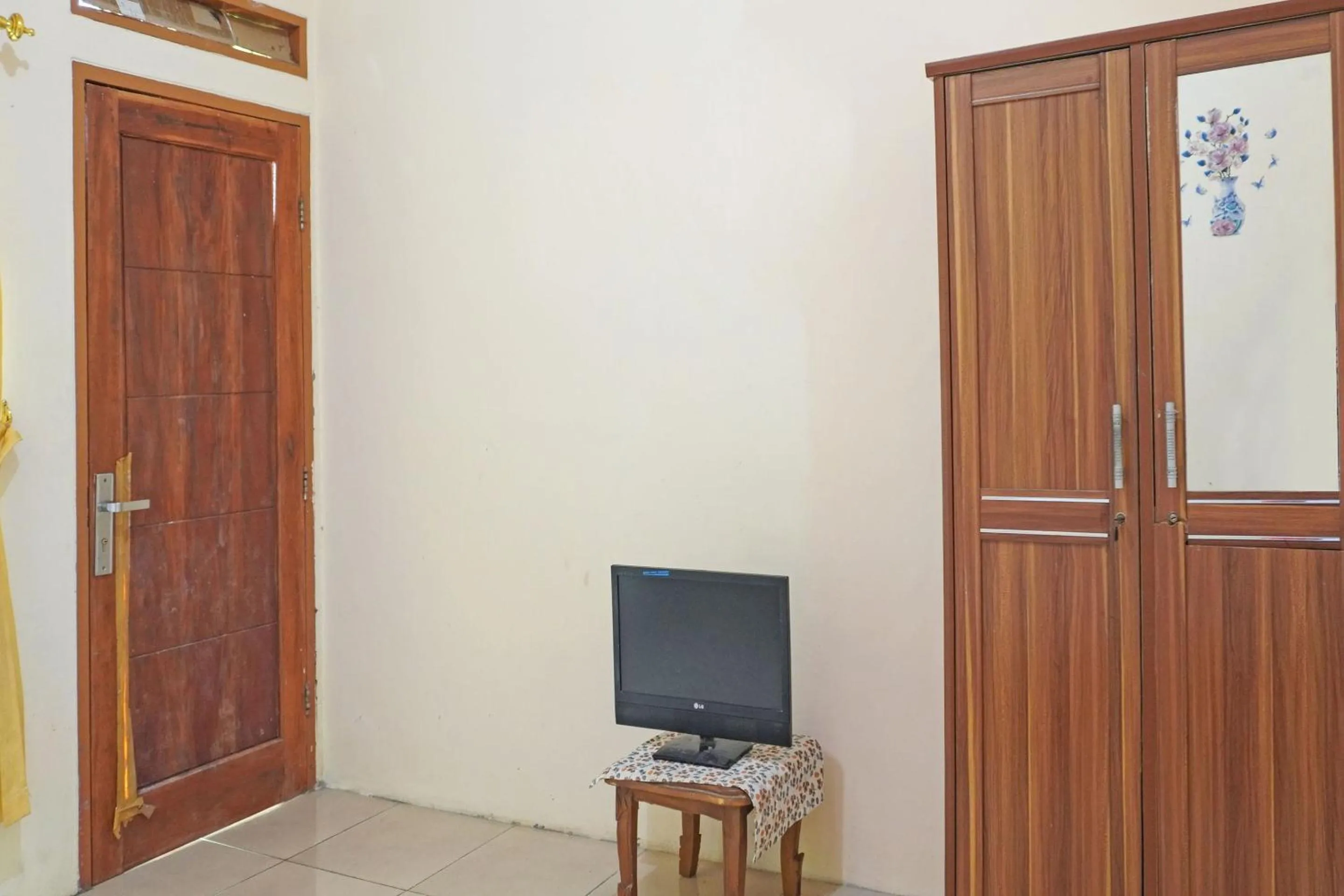 Bedroom in OYO 91762 Green Home Stay Syariah