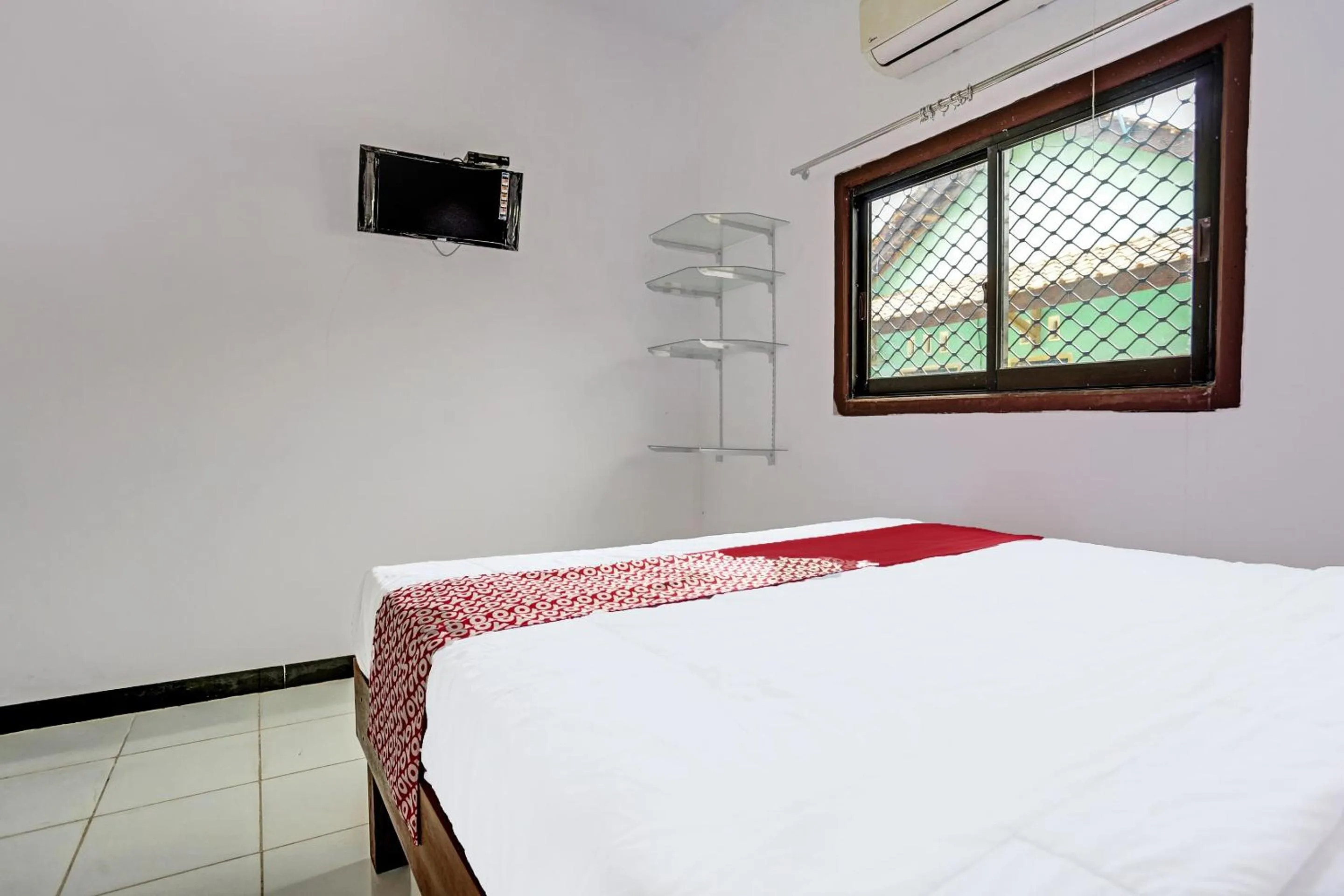 Bedroom in OYO 91773 Ab Homestay